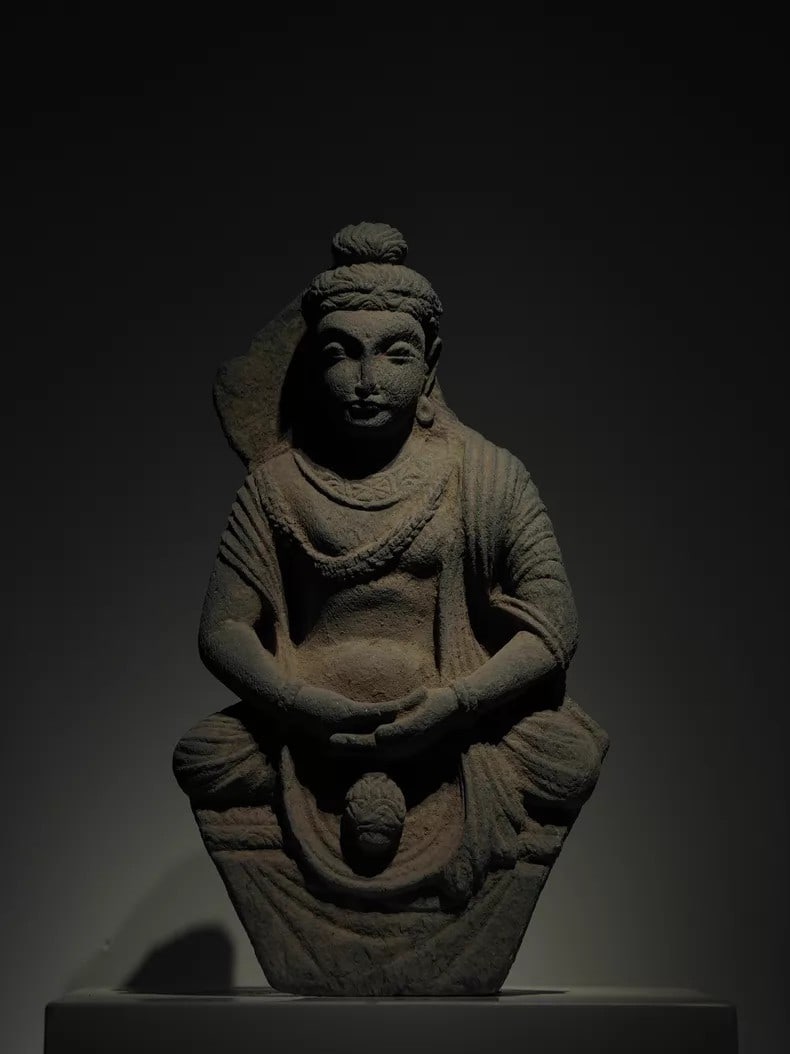 A Gandhara stone carving of Maitreya Buddha in sheet rock from the 2nd to 5th centuries AD: Gandhara stone carving Maitreya Buddha SIZE: W:20cm H:36cm (The Dimensions Of All Batches Are Manually Measured.If You Need More Detailed Information, Please Contact Our Customer Service Before Biddin