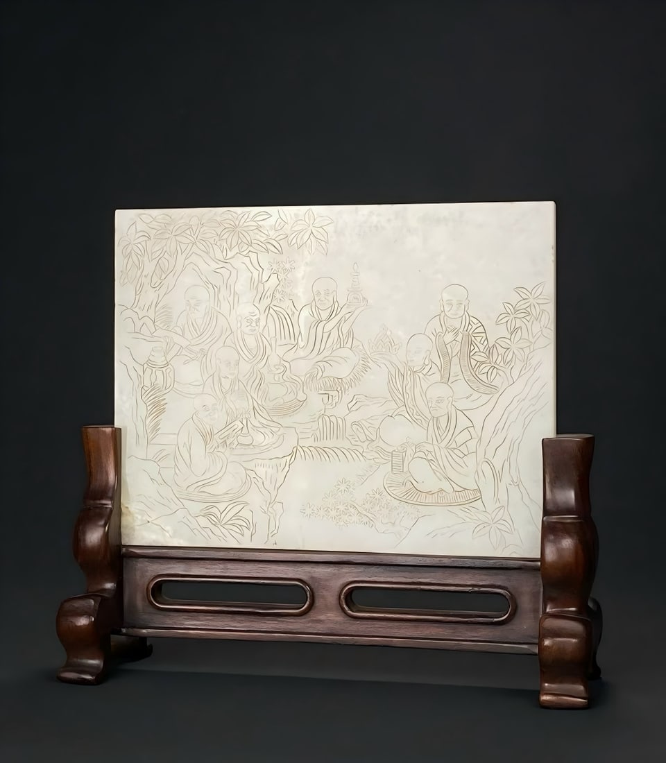 A piece of Qing Qianlong Hetian jade seed material white jade yin carved imperial sixteen Arhat: Qing Qianlong Hetian jade seed material white jade yin carved imperial sixteen Arhat picture praise screen The Qing Dynasty court believed in Buddhism, and the Palace Museum has a number of court arti