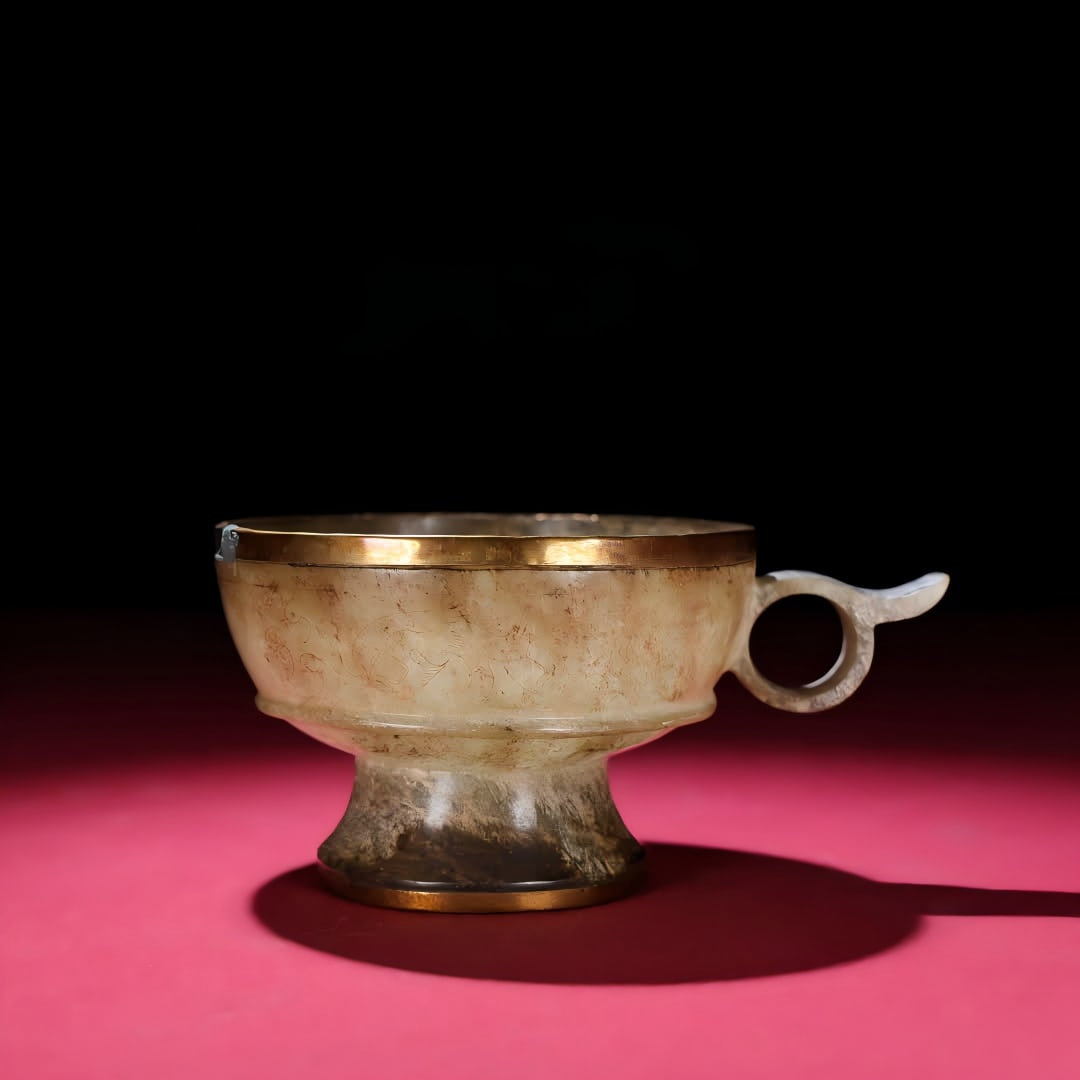 A Han Dynasty jade cup: Han dynasty jade cup SIZE: 130x97x66mm W:171g (The Dimensions Of All Batches Are Manually Measured.If You Need More Detailed Information, Please Contact Our Customer Service Before Bidding.)