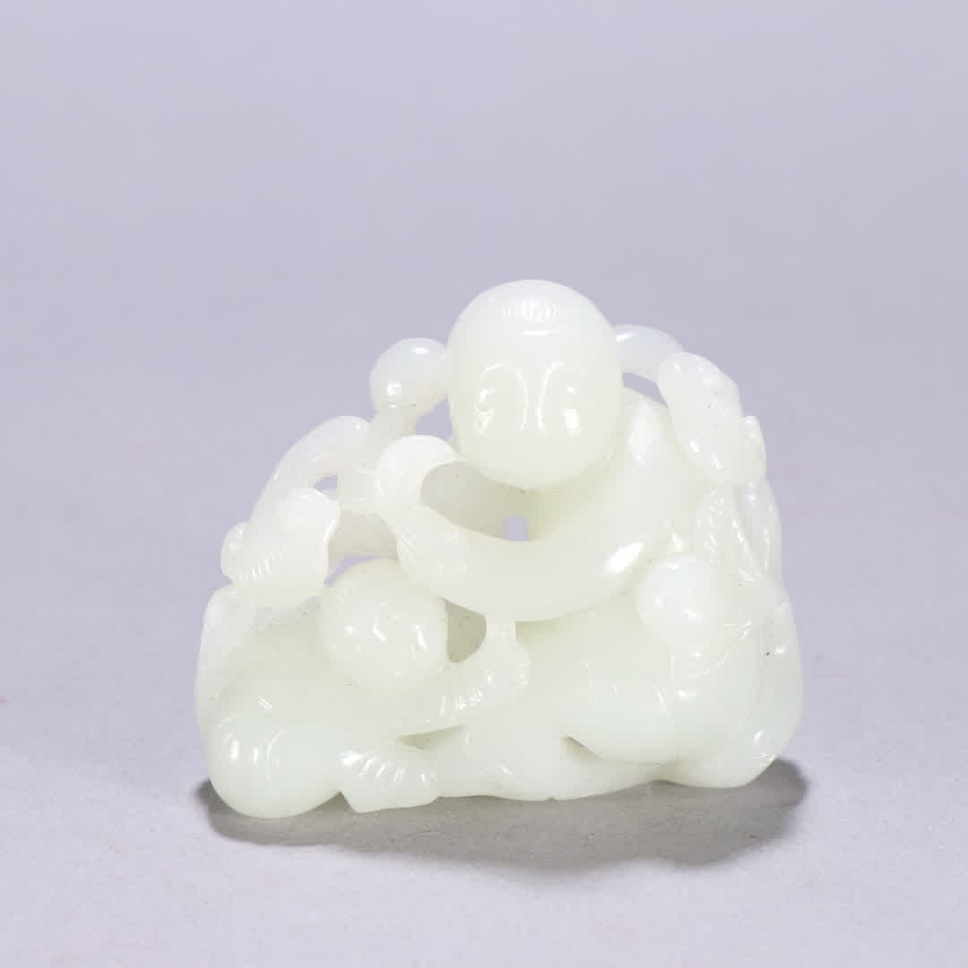 A Qing dynasty Hetian jade child carving: Qing Dynasty Hetian jade child carving SIZE: H:5.6cm W:6.7cm W:131.9g (The Dimensions Of All Batches Are Manually Measured.If You Need More Detailed Information, Please Contact Our Customer Service Be
