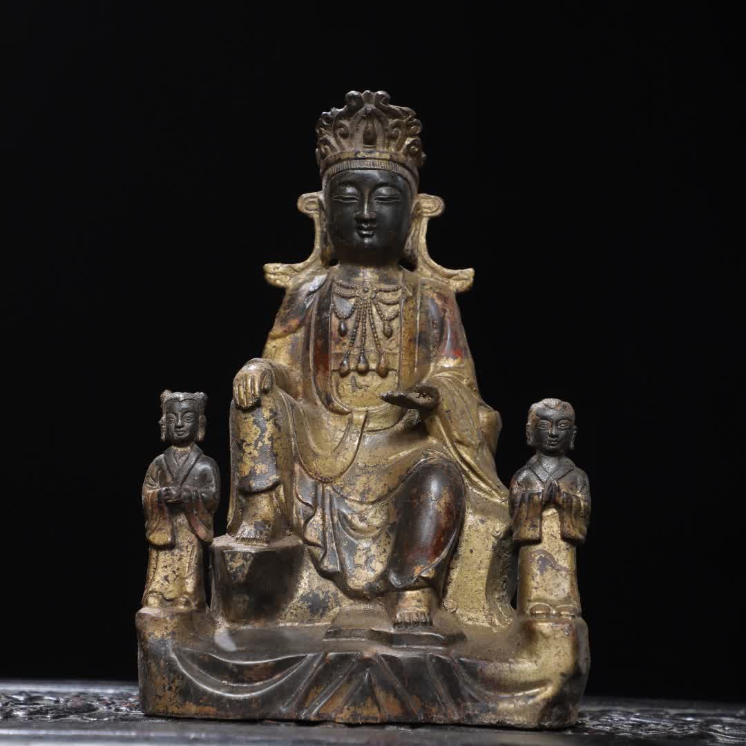 A Qing Dynasty gilt bronze statue of the Golden Boy and Jade Girl of Guanyin (1 of 9)