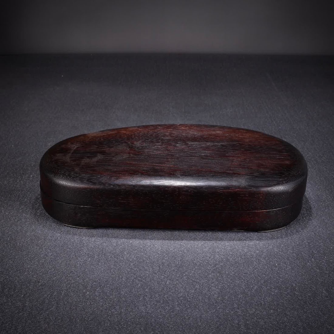 A Qing Dynasty rosewood box with lotus and duan inkstone: Qing Dynasty rosewood box lotus duan inkstone SIZE: W:3051g 24.5x14.2x3.1cm (The Dimensions Of All Batches Are Manually Measured.If You Need More Detailed Information, Please Contact Our Customer Serv