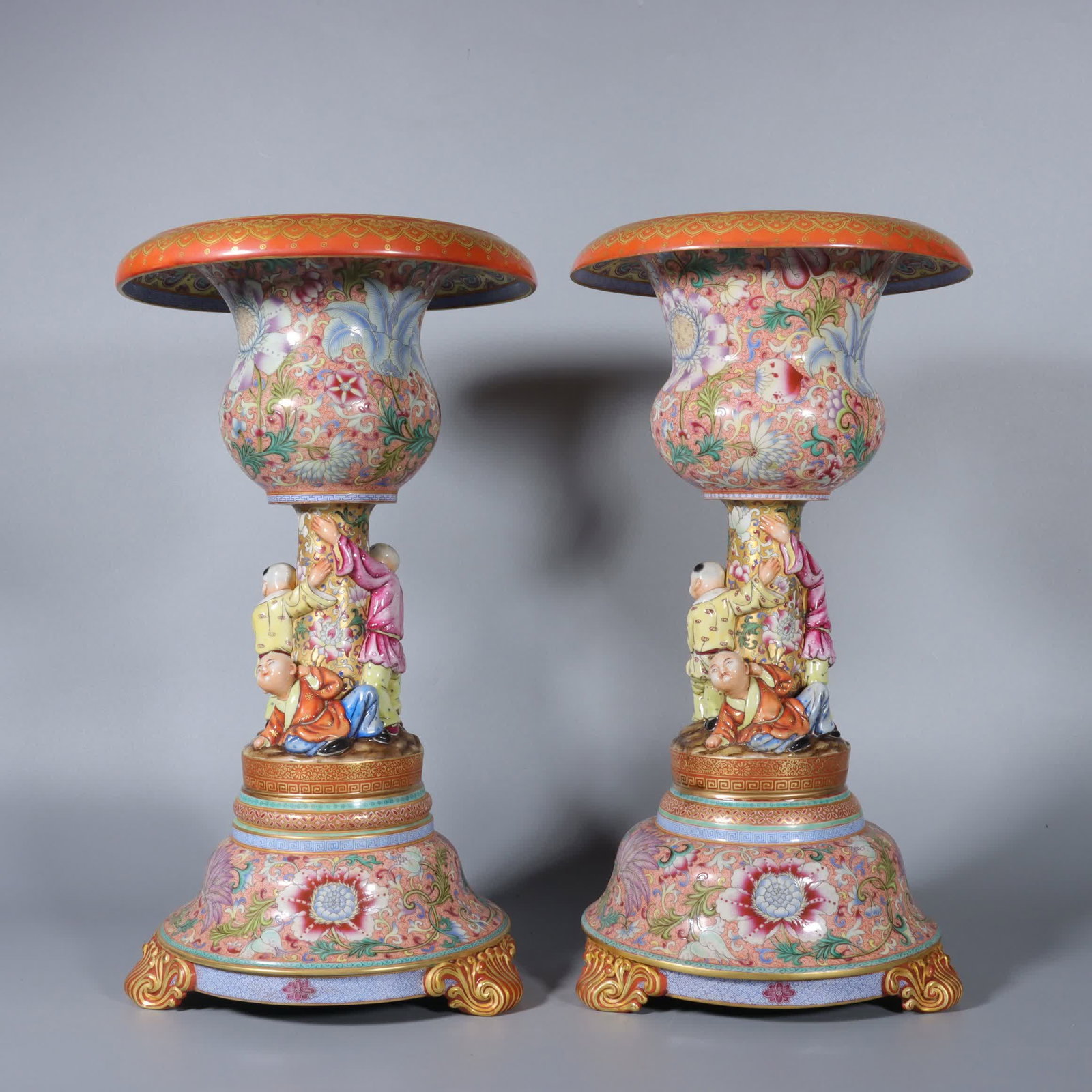 A famille rose phoenix tail grass with entwined lotus motifs and gold lotus motifs, a three-legged (1 of 9)