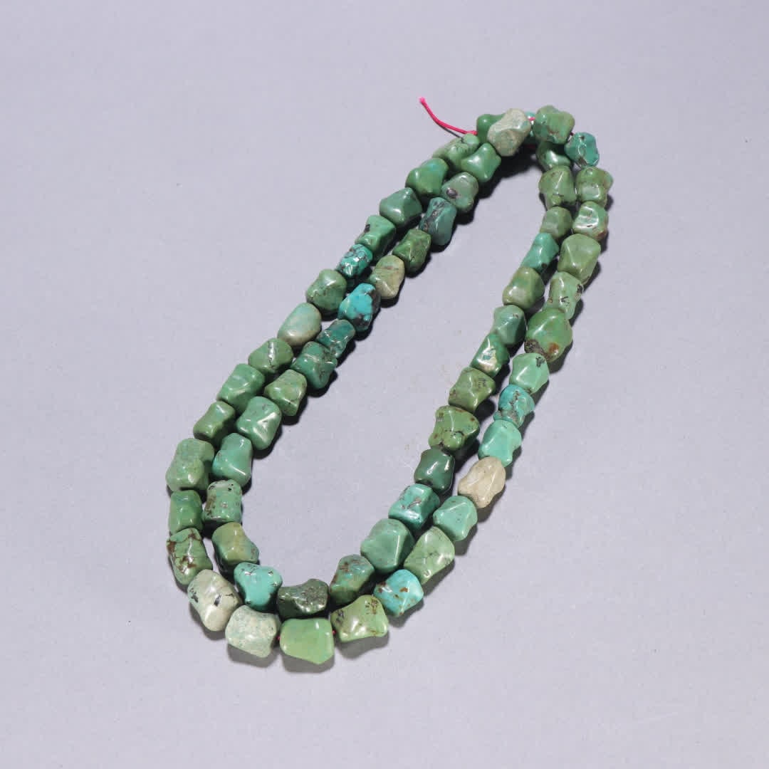 One piece of clear turquoise 108 prayer beads (1 of 9)