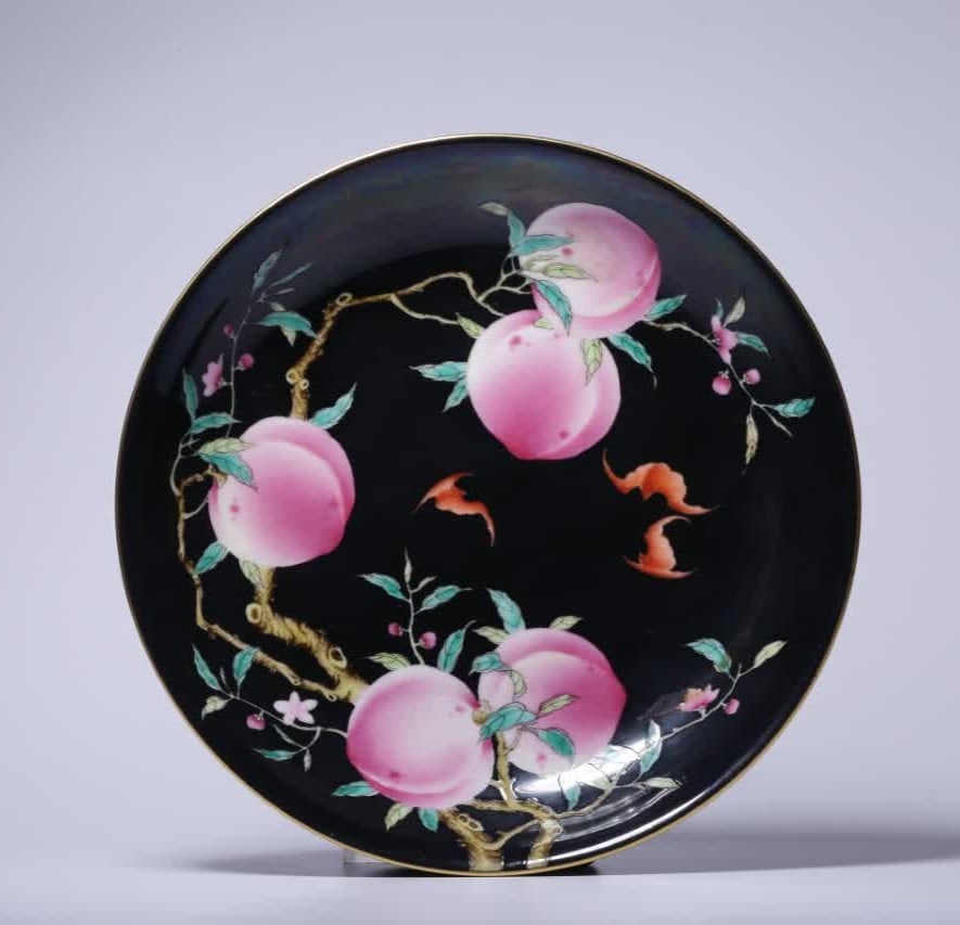 A Qianlong period ink-based famille rose plate with continuous blessing and longevity patterns (1 of 9)