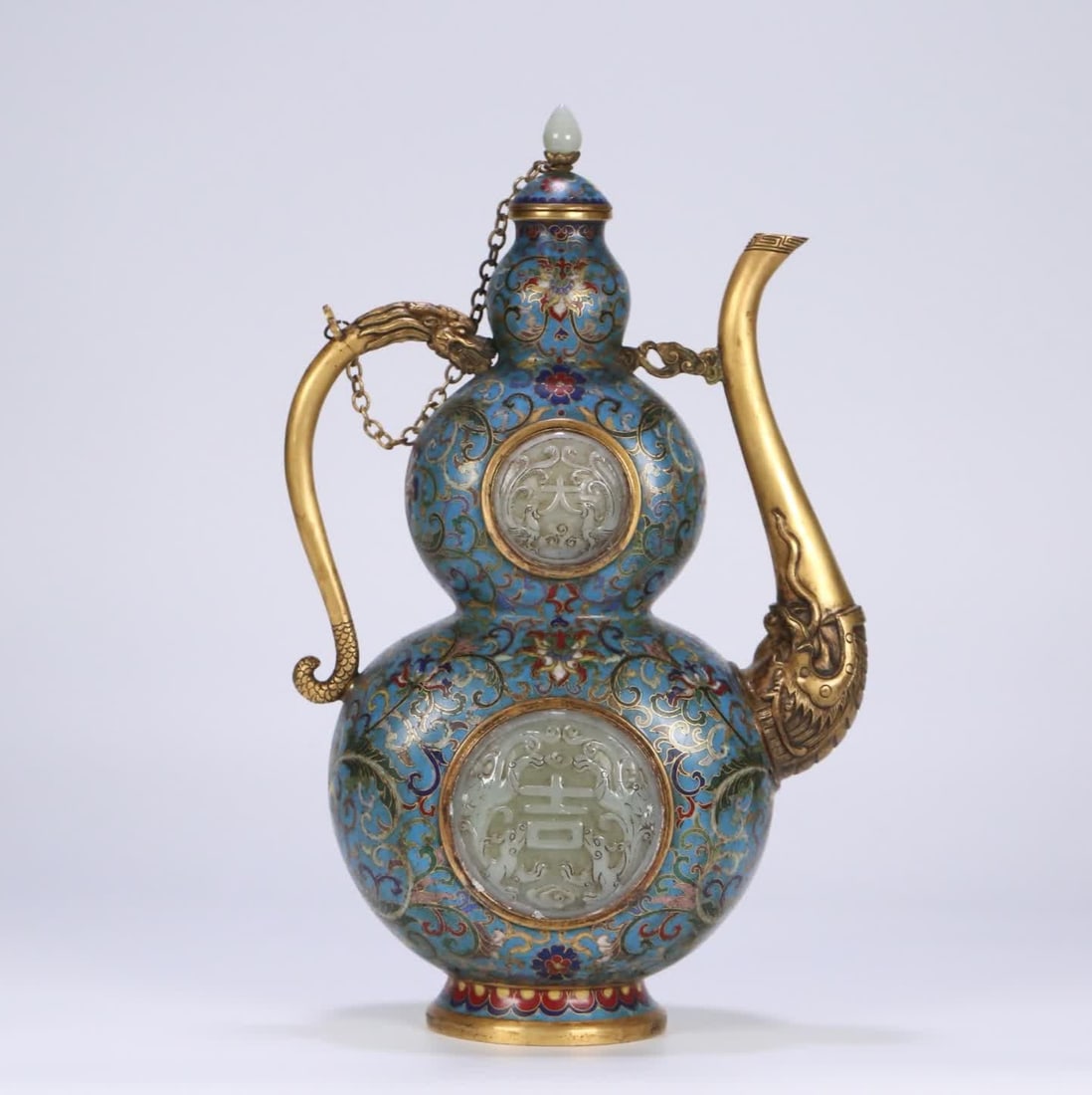 A Qing Dynasty Qianlong period cloisonne inlaid Hetian jade dragon and phoenix auspicious gourd wine: Qing Dynasty Qianlong period cloisonne inlaid Hetian jade dragon phoenix auspicious gourd wine pot SIZE: 31.5x19x12cm W:1655.8g (The Dimensions Of All Batches Are Manually Measured.If You Need More De