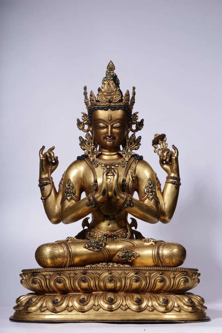 A Qing Dynasty gilded bronze inlaid four-armed Guanyin statue: A Qing Dynasty gilded bronze inlaid four-armed Guanyin statue SIZE: H:50.5cm L:38cm W:29cm W:13.05kg (The Dimensions Of All Batches Are Manually Measured.If You Need More Detailed Information, Please 