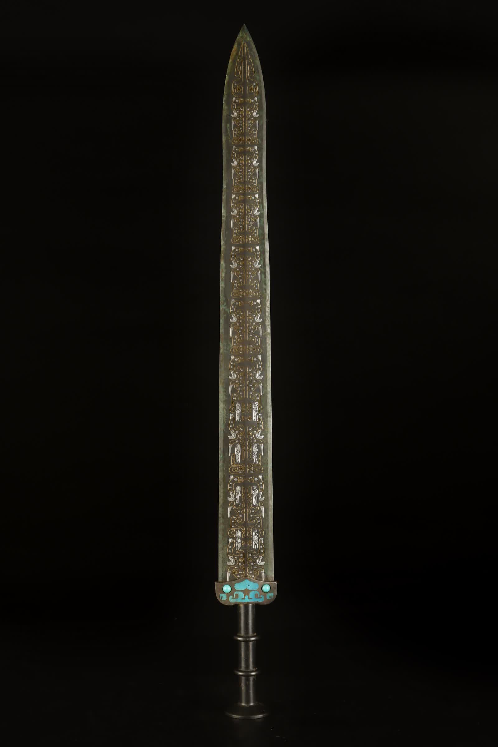 A Warring States period bronze sword inlaid with gold and silver (1 of 9)