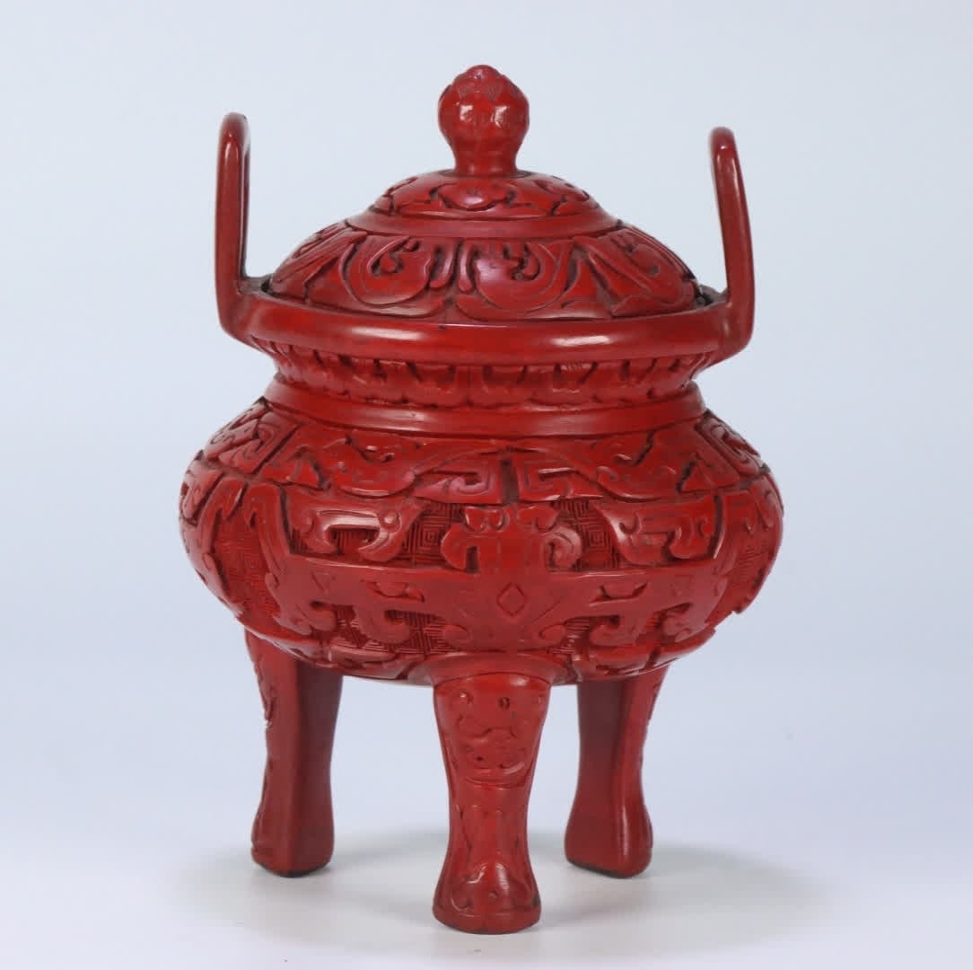 One is a Qing Dynasty carved red three-legged double-handled burner: Qing Dynasty carved red three-legged double-handled burner SIZE: 16.5x11.55cm W:404g (The Dimensions Of All Batches Are Manually Measured.If You Need More Detailed Information, Please Contact Our Cust