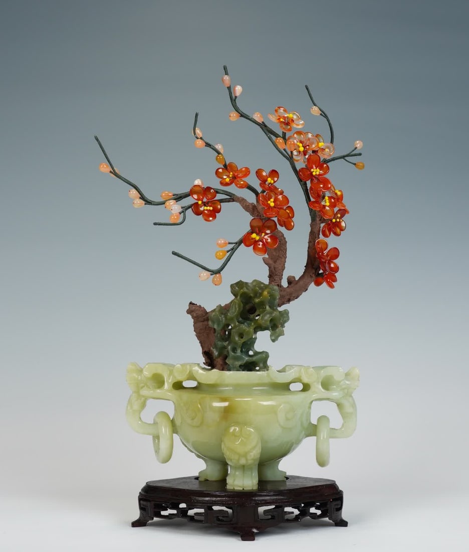 A Republic of China-era jade bonsai with flowers on a tripod: A flowering jade bonsai from the Republic of China era SIZE: Combined Tray Overall H: 34cm, Without Tray: H: 31.5cm, W: 25.5cm (The Dimensions Of All Batches Are Manually Measured.If You Need More Det