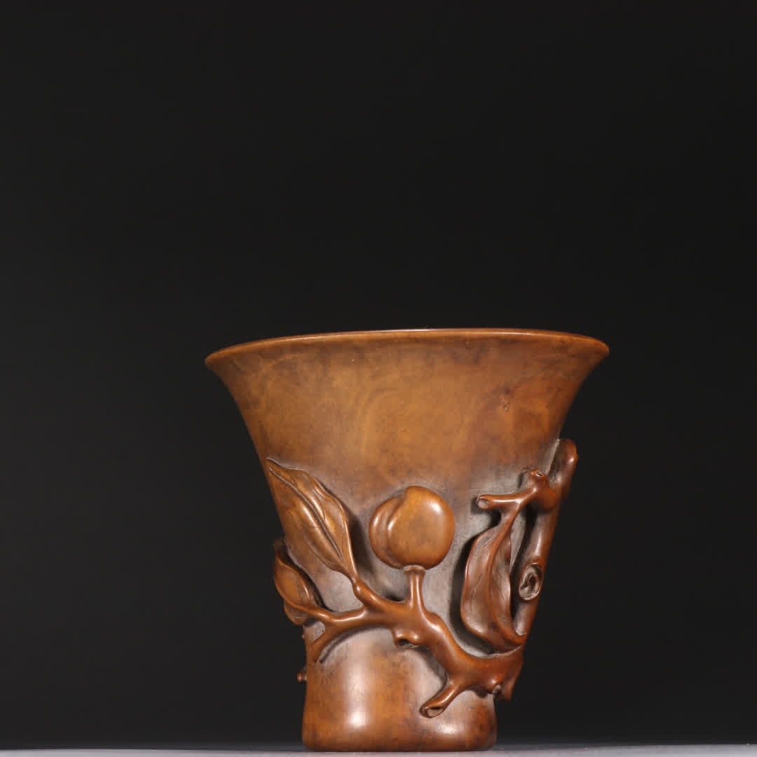 A Qing dynasty boxwood longevity peach pattern (1 of 9)