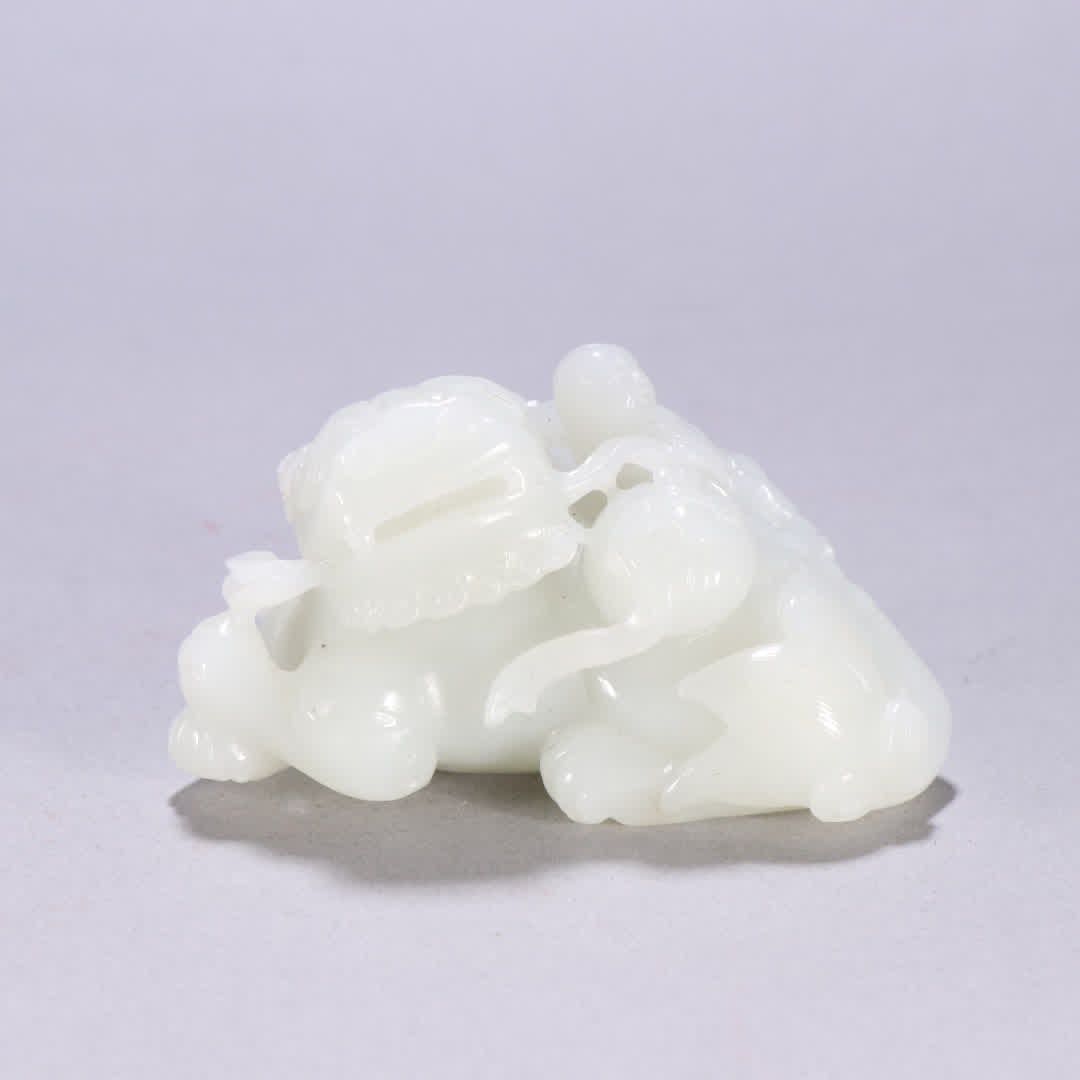 A piece of Qing dynasty Hetian jade boy playing with beasts: Qing dynasty Hetian Jade Boy playing with beasts ornament SIZE: H:4.7cm W:8.6cm W:250g (The Dimensions Of All Batches Are Manually Measured.If You Need More Detailed Information, Please Contact Our Cu