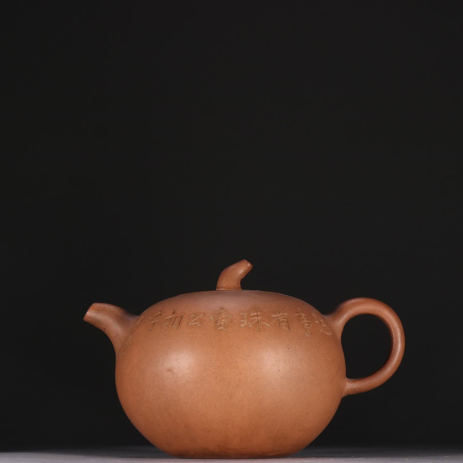 One item: He Xinzhou Signature Yixing Clay Teapot: He Xinzhou inscribed a purple clay teapot SIZE: H:9cm W:14cm (The Dimensions Of All Batches Are Manually Measured.If You Need More Detailed Information, Please Contact Our Customer Service Before