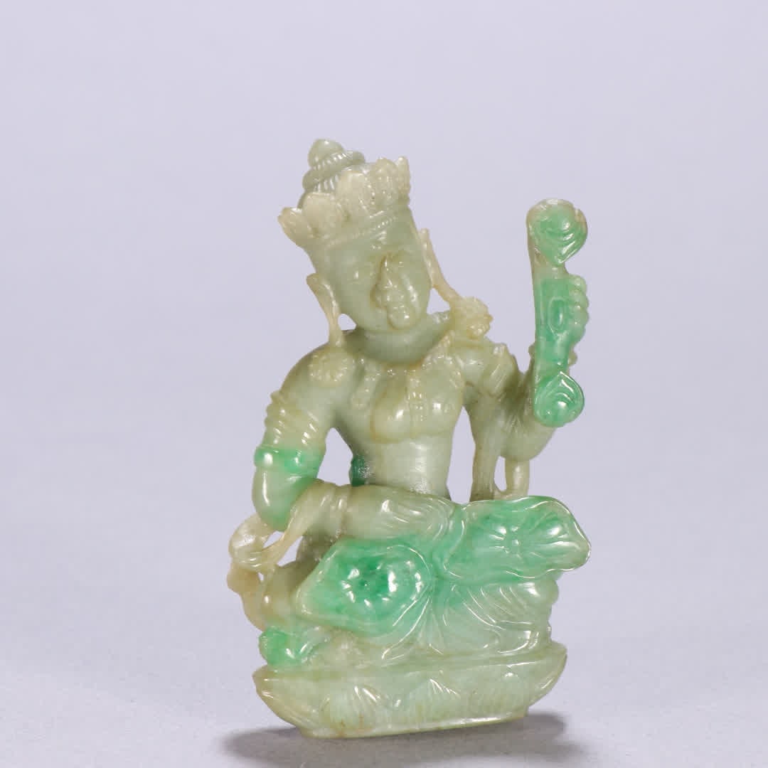 A Qing dynasty jadeite Guanyin statue: Qing Dynasty: Jade Guanyin statue SIZE: H:7.3cm W:4.3cm W:59.5g (The Dimensions Of All Batches Are Manually Measured.If You Need More Detailed Information, Please Contact Our Customer Service Before