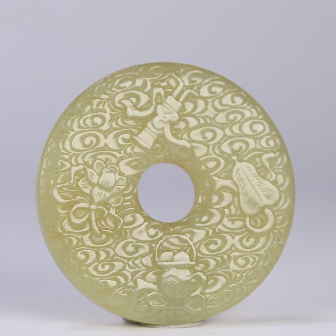 A Qing Dynasty Hetian yellow jade hidden Eight Immortals plaque (1 of 8)