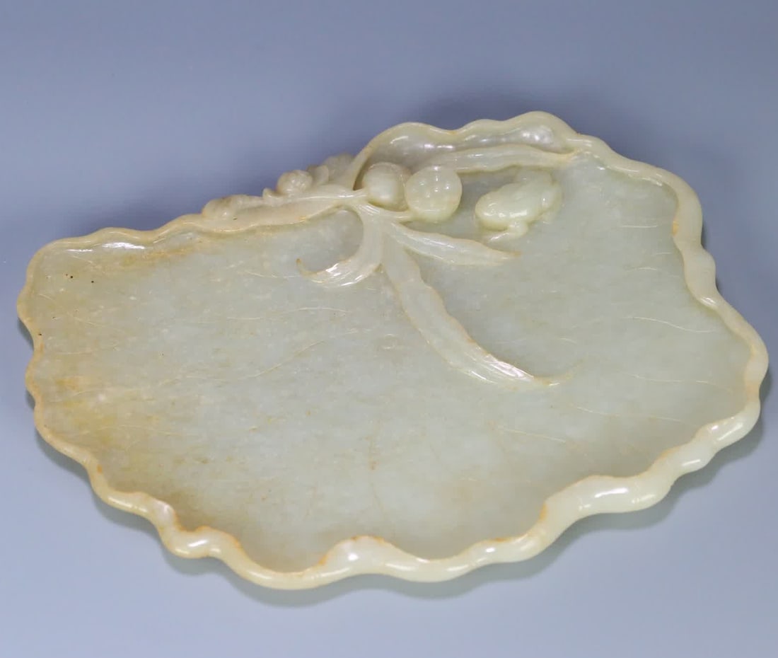 A Qing Dynasty Hetian jade with frog lotus leaf washing (1 of 9)