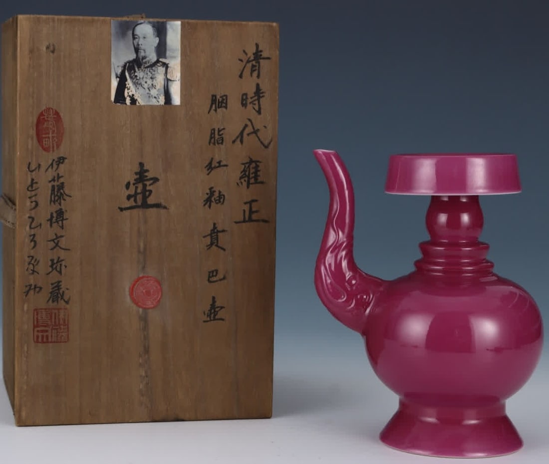 One is a Benba teapot with rouge red glaze from the Yongzheng period of the Qing Dynasty (1 of 9)