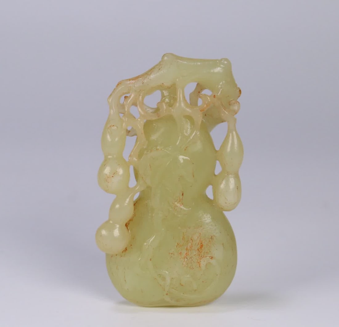 A Qing Dynasty Hetian yellow jade gourd handle piece with many children and many blessings (1 of 9)