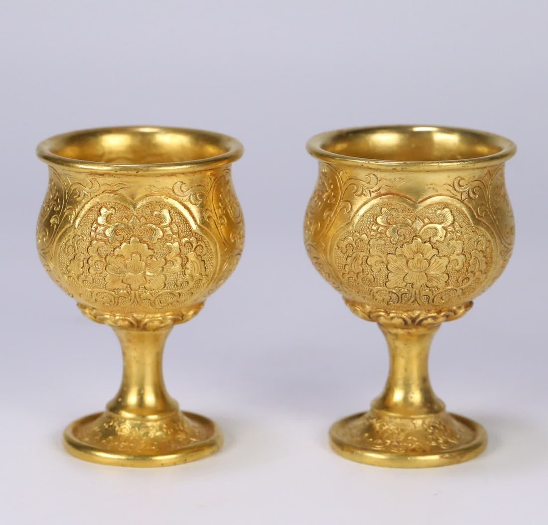 A pair of Qing Dynasty gilded bronze stemmed cups with entwined floral patterns (1 of 9)