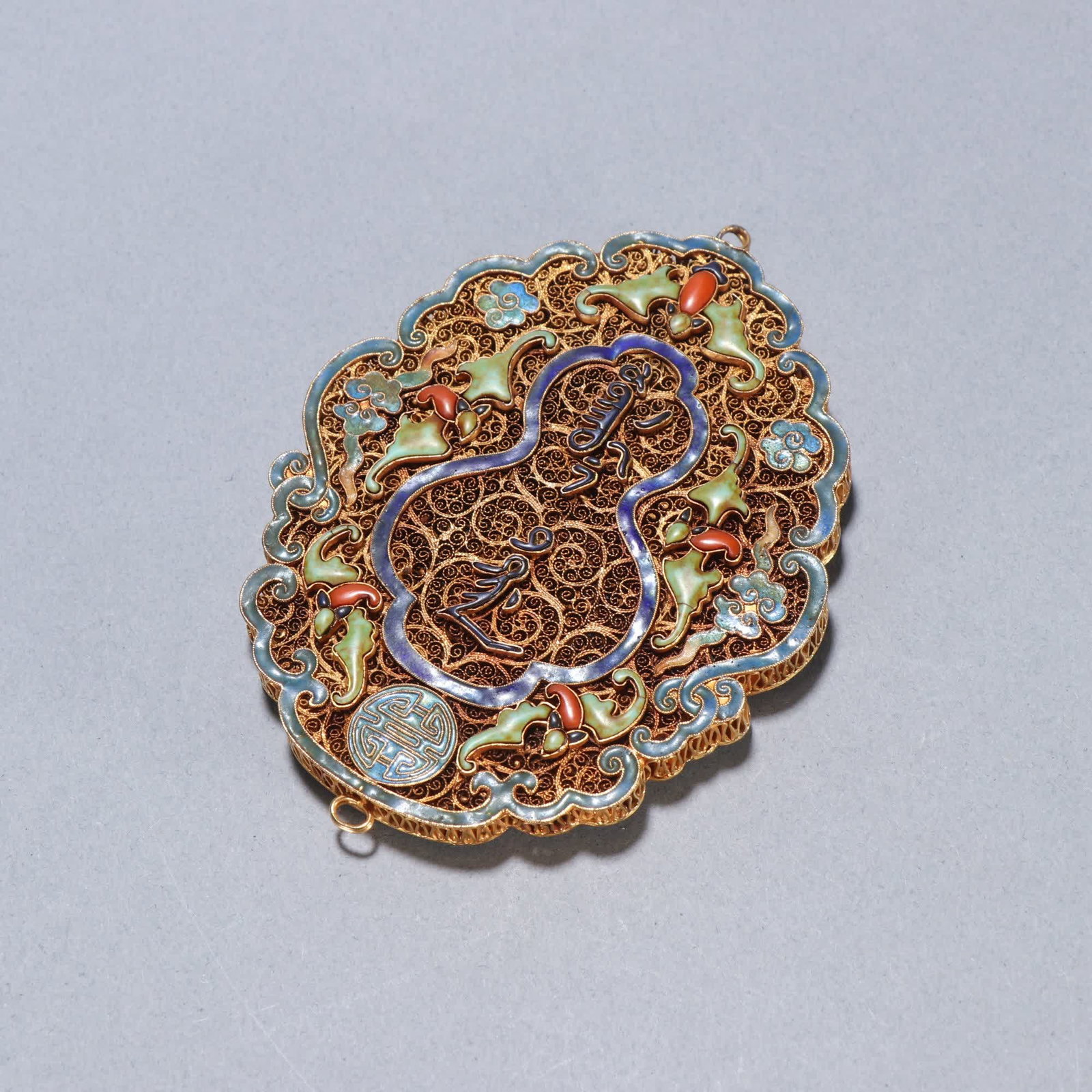 A Qing dynasty silver gilt blue fasting sign is displayed (1 of 9)
