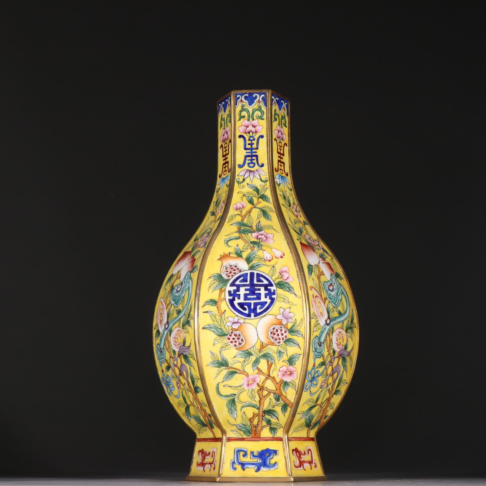 A Qing dynasty copper gilt painted enamel three-piece six-square vase (1 of 9)