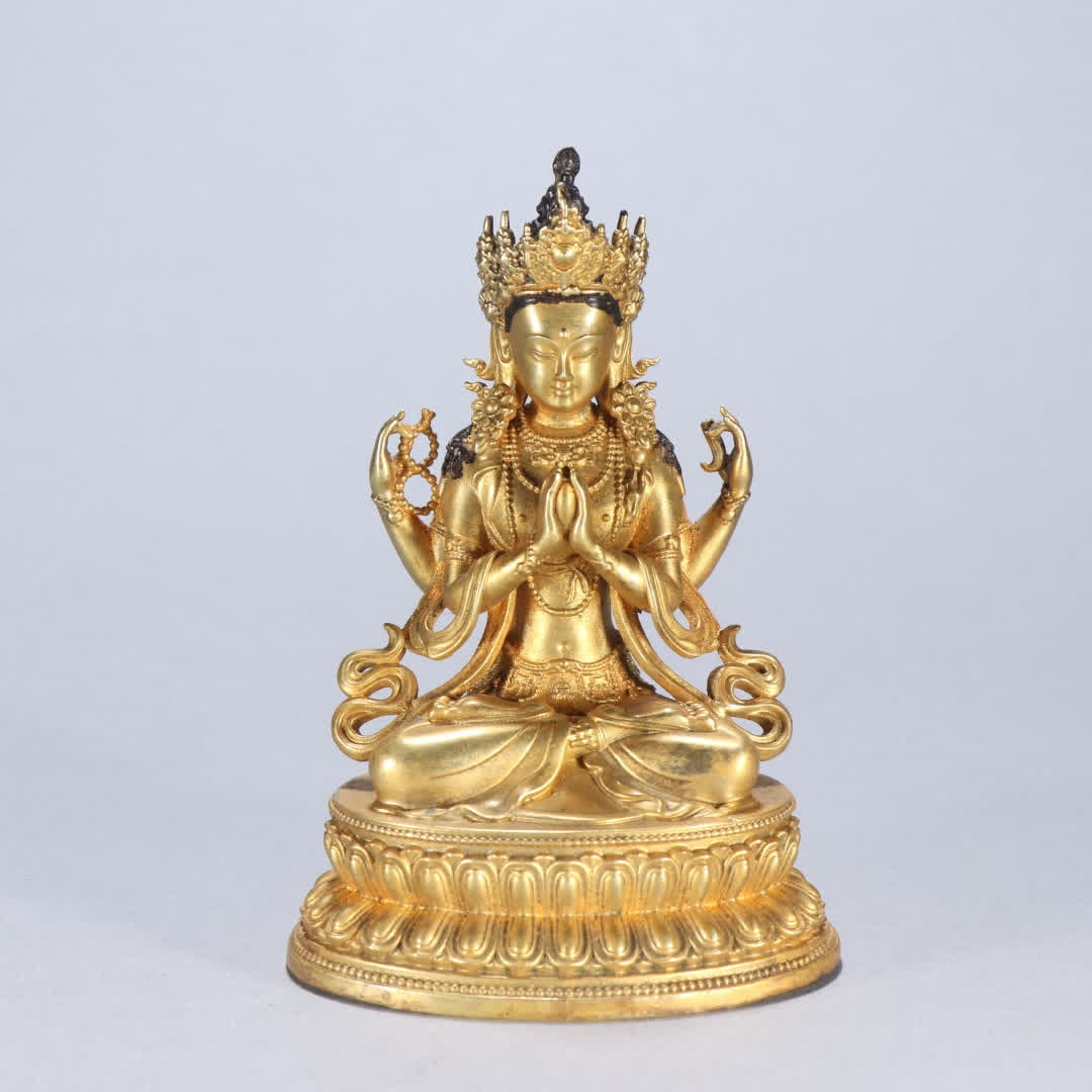 A Qing dynasty gilt bronze four-armed Guanyin statue: Qing Dynasty: Gilt bronze four-armed Guanyin statue SIZE: H:11.6cm W:7.3cm W:483.3g (The Dimensions Of All Batches Are Manually Measured.If You Need More Detailed Information, Please Contact Our Custo