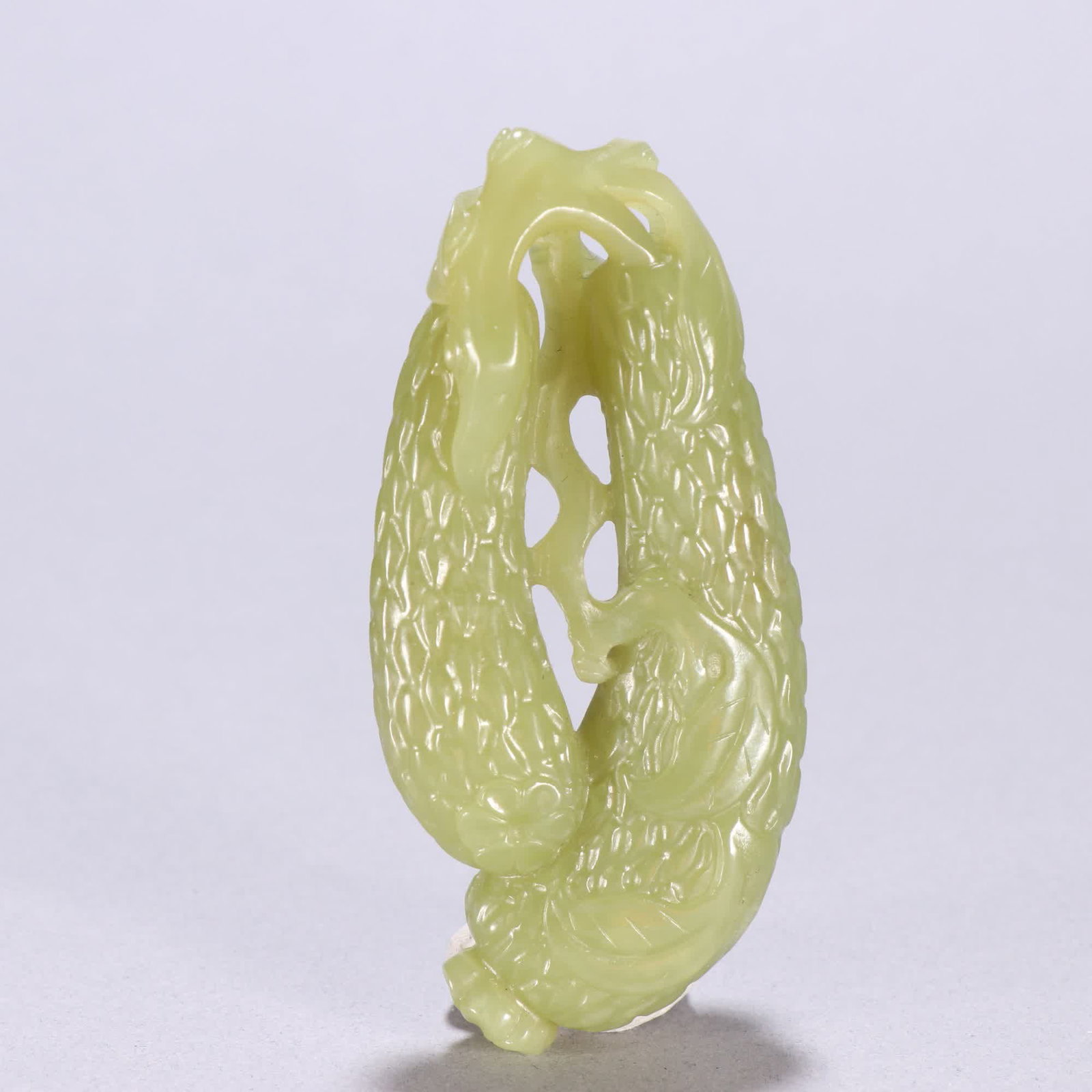 A Qing dynasty Hetian yellow jade cucumber handle: Qing Dynasty: Hetian yellow jade cucumber handle SIZE: H:8.5cm W:3.9cm W:74.3g (The Dimensions Of All Batches Are Manually Measured.If You Need More Detailed Information, Please Contact Our Customer S