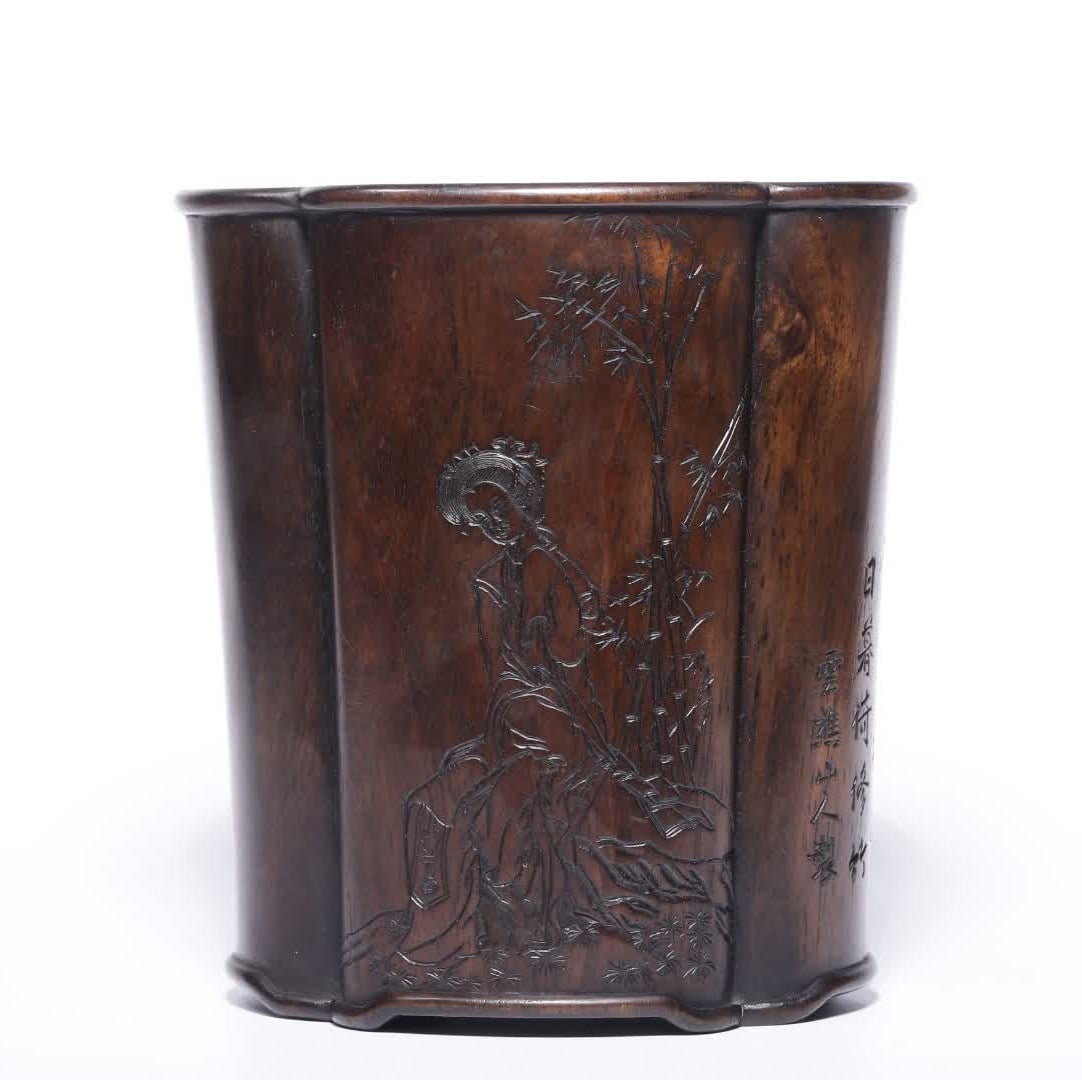 A Qing Dynasty brush pot shaped like a crabapple with a Huanghuali carved with a bamboo-shaded lady (1 of 8)