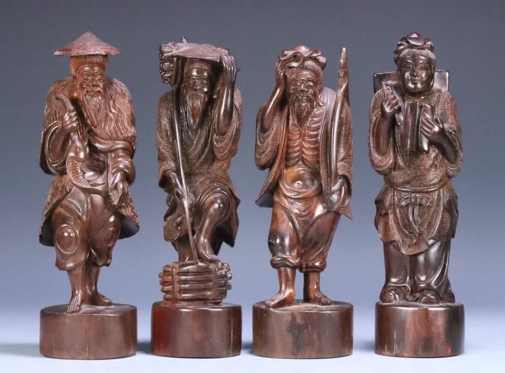 A set of Qing dynasty small-leaf rosewood carvings of fishermen, woodcutters, farmers, and scholars (1 of 10)