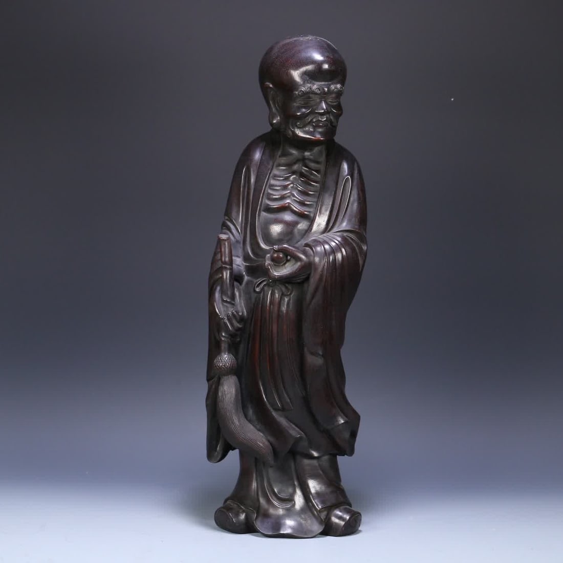 A late Qing dynasty rosewood skinny Arhat ornament: Late Qing Dynasty rosewood slender bone Arhat ornament SIZE: 48x15x12cm W:3540 (The Dimensions Of All Batches Are Manually Measured.If You Need More Detailed Information, Please Contact Our Customer S