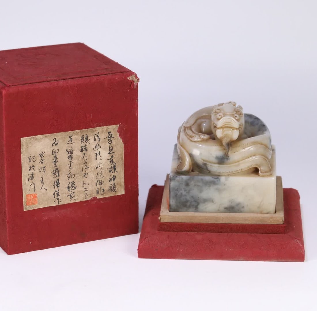 One is a large seal with a stone dragon knob from Shoushan, Fujian, from the Qing Dynasty (1 of 9)