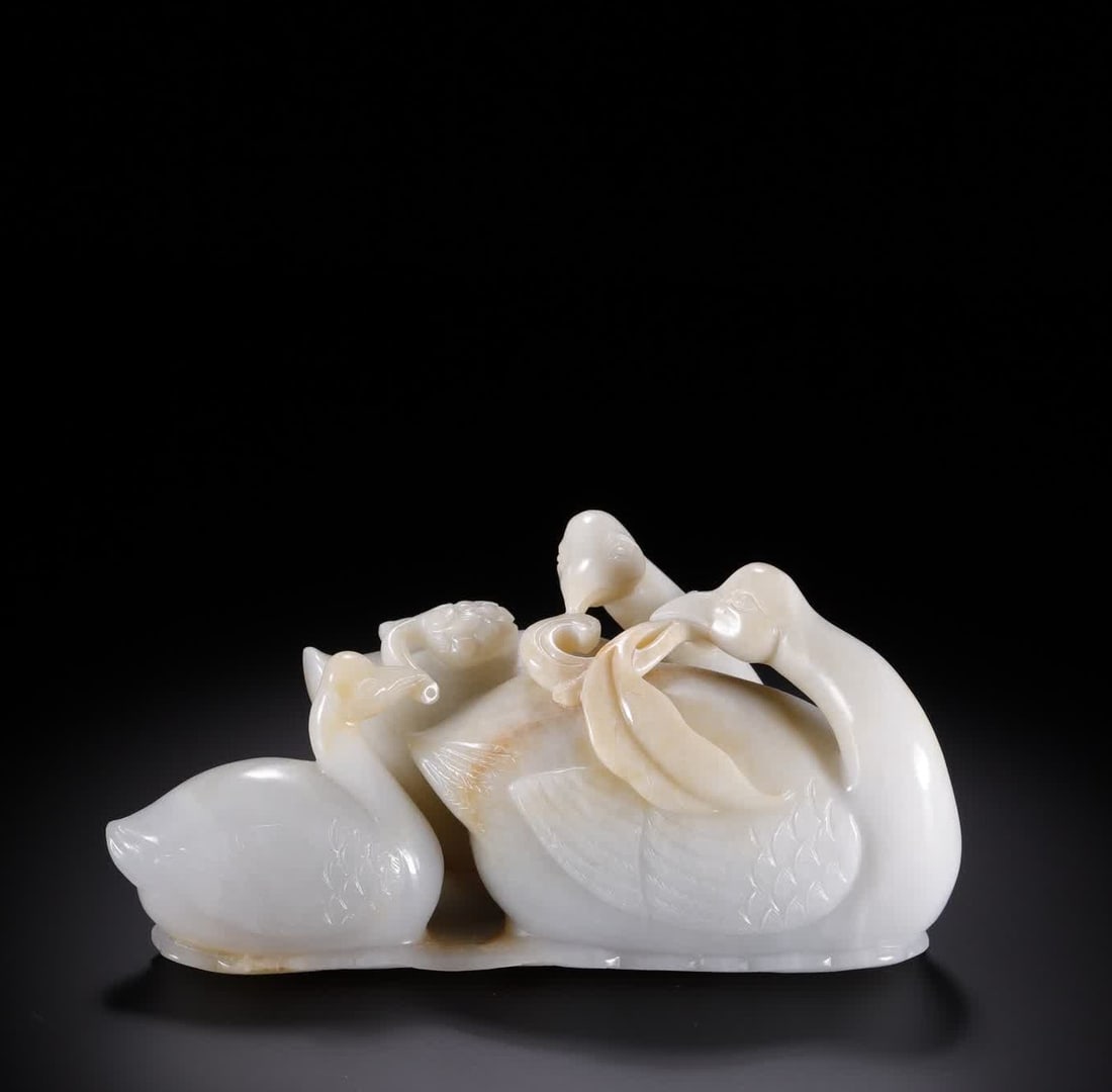A Qing Dynasty Hetian jade treasure duck playing with lotus ornament: Qing Dynasty Hetian Jade Treasure Duck Playing with Lotus Ornament SIZE: 12.2x5.2x5.8cm W:402.5g (The Dimensions Of All Batches Are Manually Measured.If You Need More Detailed Information, Please Cont