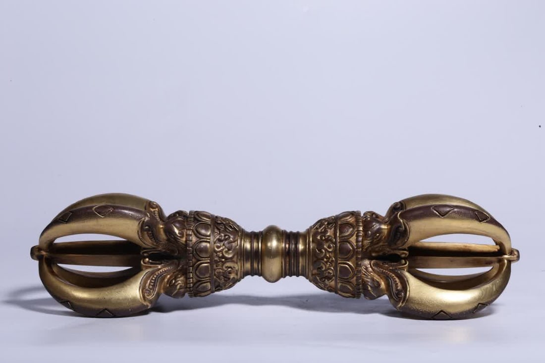 One piece is a Qing Dynasty gilded bronze vajra pestle (1 of 6)