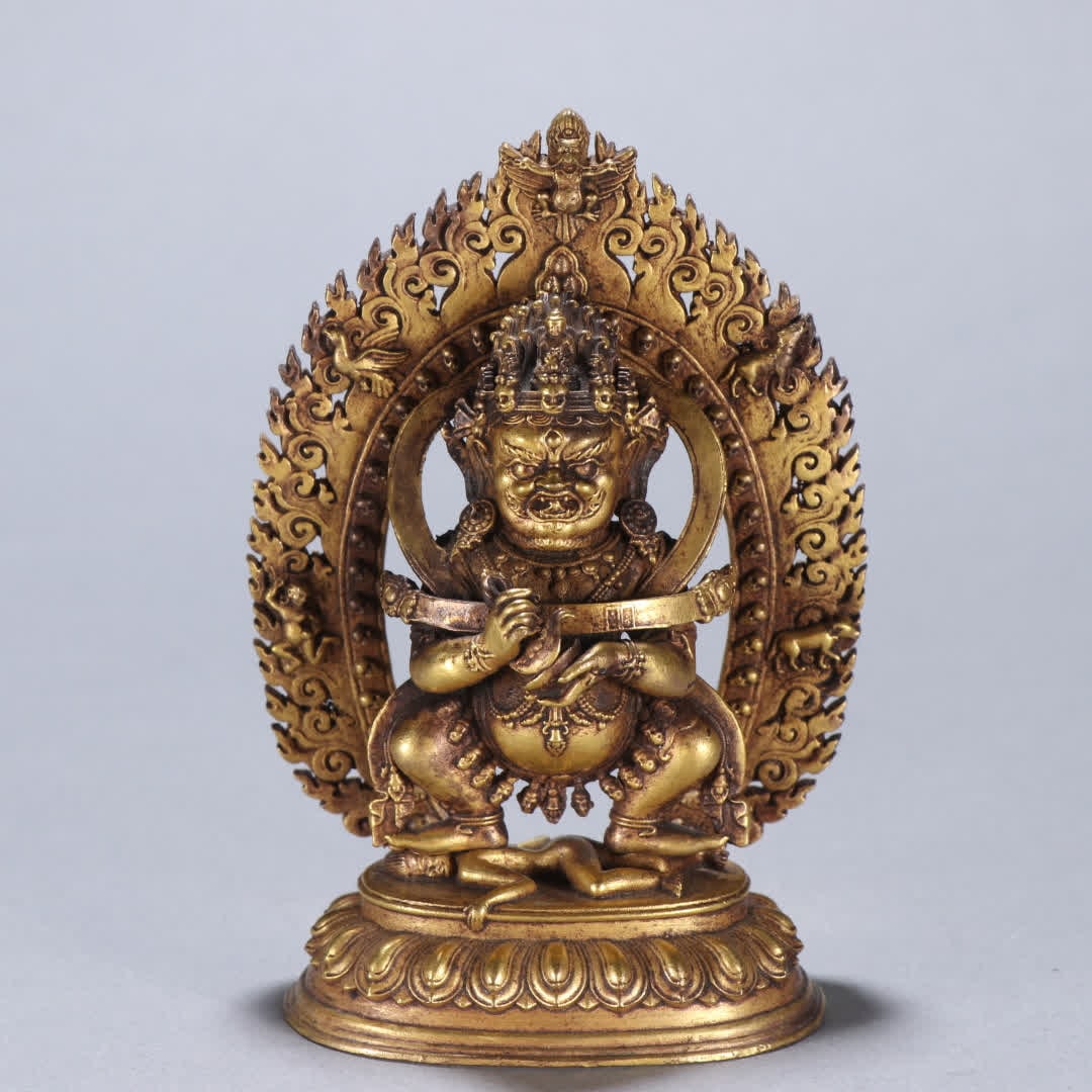 A Qing dynasty gilt bronze two-armed Mahakala statue: Qing Dynasty, gilt bronze two-armed Mahagala statue SIZE: H:10.5cm W:7.3cm W:268.3g (The Dimensions Of All Batches Are Manually Measured.If You Need More Detailed Information, Please Contact Our Custo