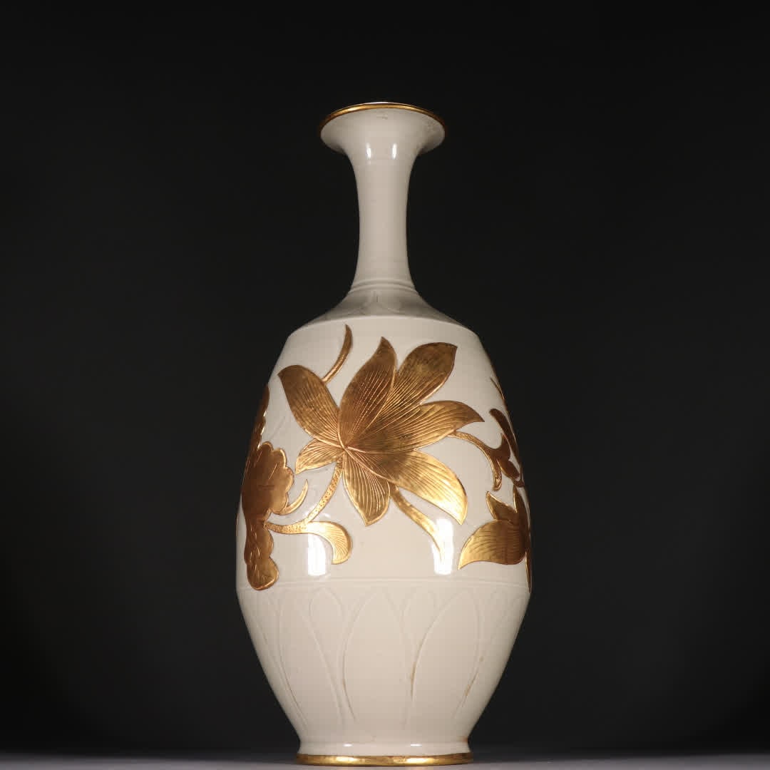 A jade spring vase with golden lotus floral patterns from the Qing Ding kiln (1 of 9)