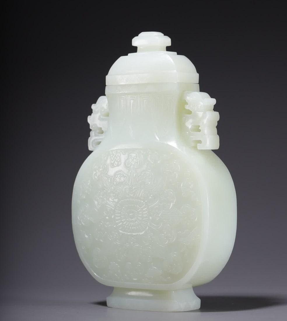 A Qing Dynasty Hetian jade dragon-ear vase: Qing Dynasty Hetian jade dragon ear vase SIZE: 17.5x10.7x4.5cm W:695g (The Dimensions Of All Batches Are Manually Measured.If You Need More Detailed Information, Please Contact Our Customer Service Be