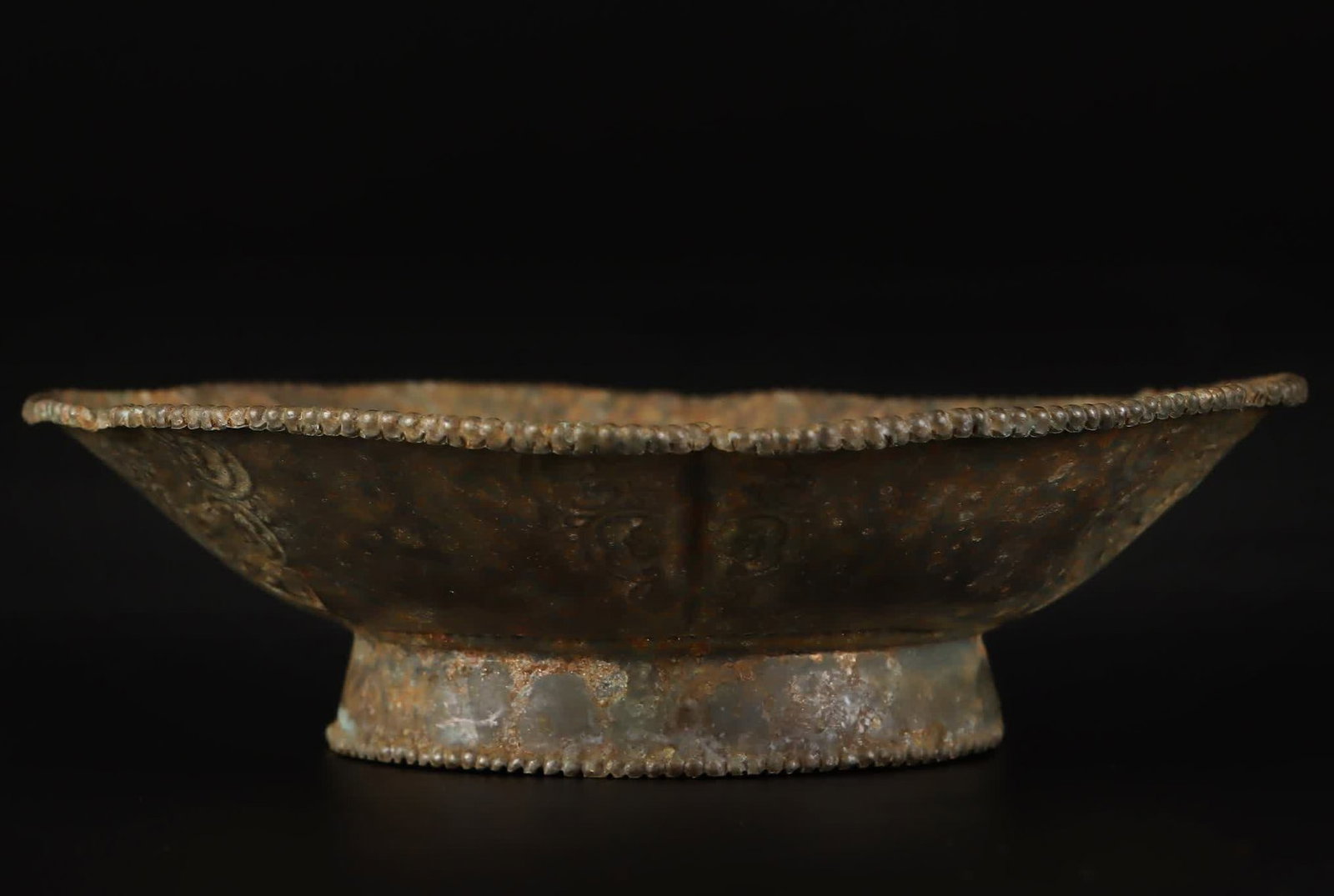 A Tang Dynasty six-petal small dish (1 of 9)