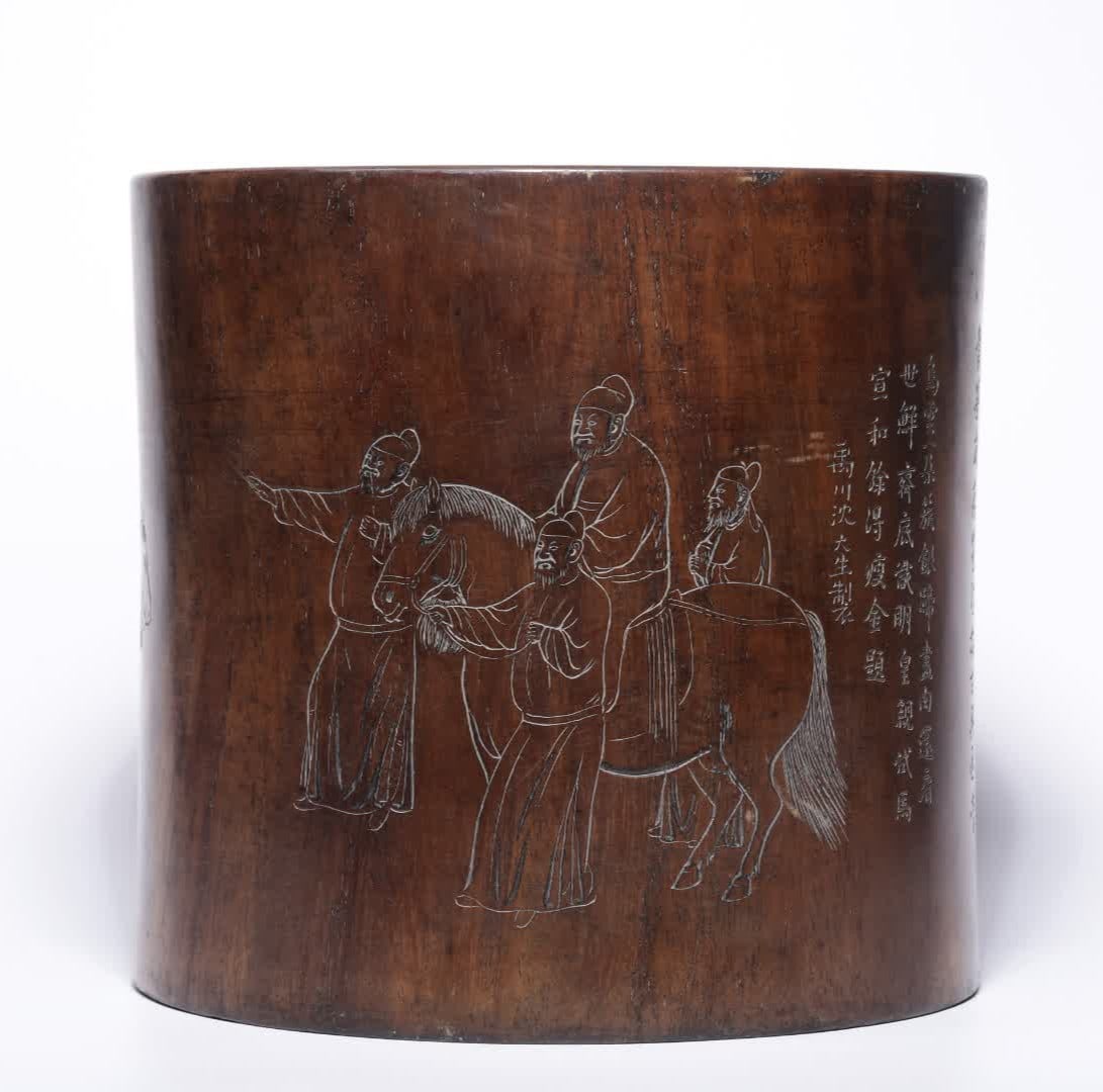 One is a Ming dynasty brush holder made by Shen Dasheng of Yuchuan, featuring huanghuali wood carved: Ming dynasty Yuchuan Shen Dasheng made a Huanghuali brush holder carved with a bright yellow horse trial painting SIZE: H: 17.3cm, Diameter 18cm, W: 1059g (The Dimensions Of All Batches Are Manually