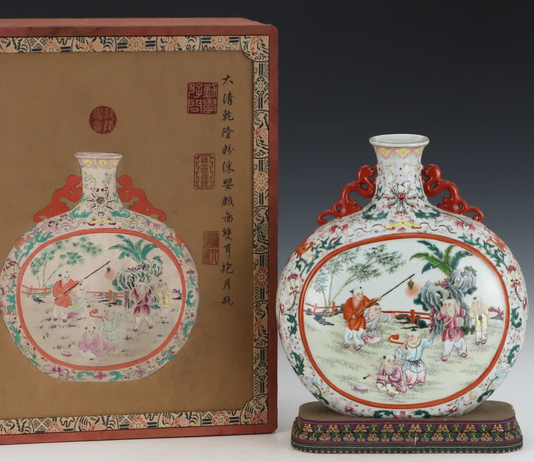 A Qing dynasty Qianlong famille rose infant play vase with double handles embracing the moon: Qing Dynasty Qianlong famille rose infant play vase with double ears embracing the moon SIZE: H: 29.5cm Abdominal diameter 25.7cm (The Dimensions Of All Batches Are Manually Measured.If You Need More 