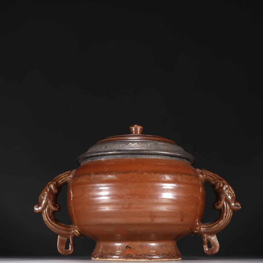 One is a Qing Dynasty sauce-glazed gui-style lidded jar: A sauce-glazed gui-style lidded jar from the Qing Dynasty SIZE: H:16cm W:24cm (The Dimensions Of All Batches Are Manually Measured.If You Need More Detailed Information, Please Contact Our Customer Se