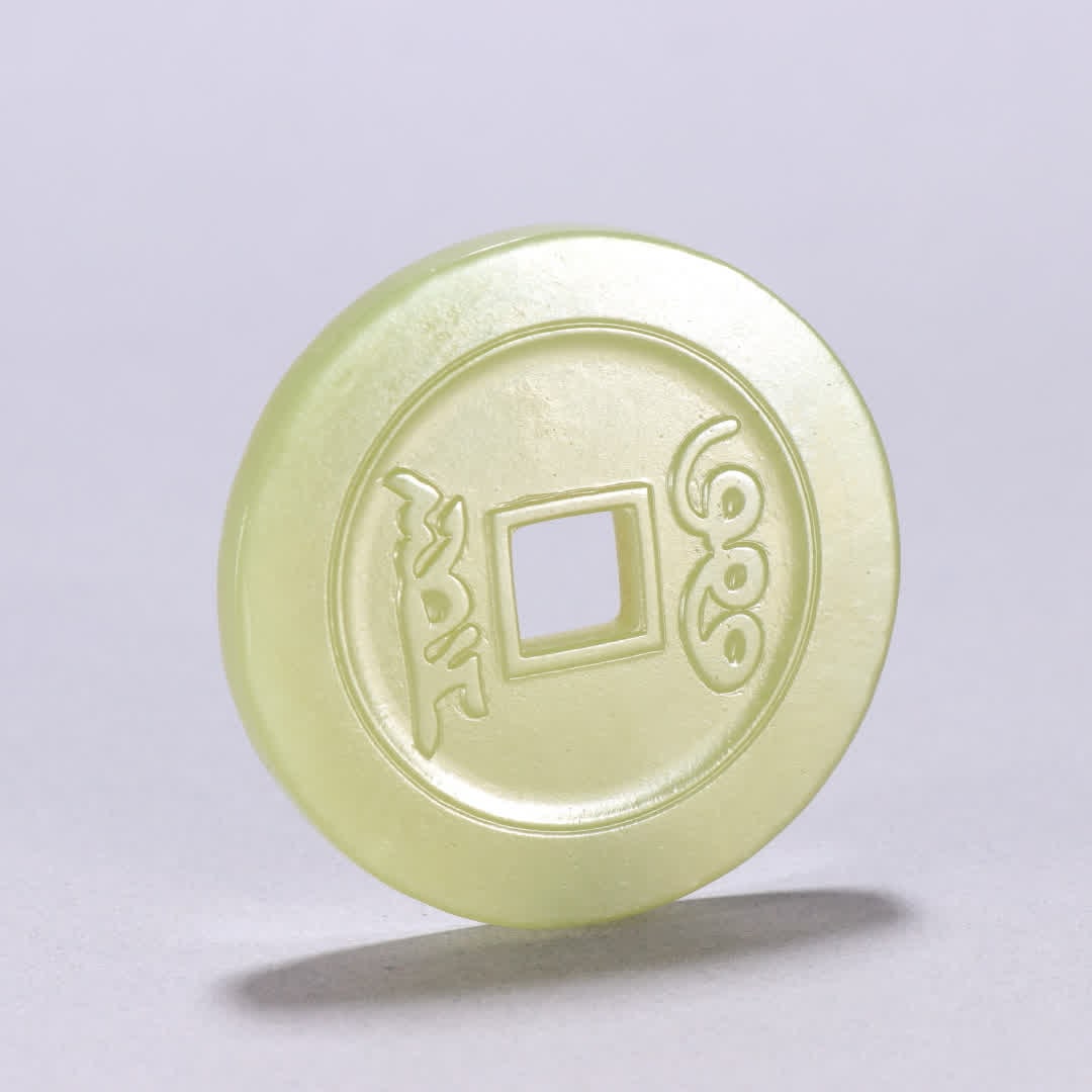 A Qing dynasty yellow jade Yongzheng Tongbao coin: Qing dynasty yellow jade Yongzheng Tongbao coins SIZE: W:5.6cm W:37.4g (The Dimensions Of All Batches Are Manually Measured.If You Need More Detailed Information, Please Contact Our Customer Service