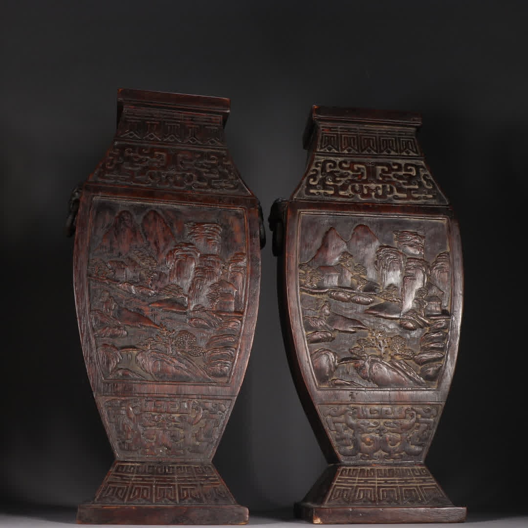 A pair of Qing dynasty agarwood landscape vases (1 of 9)