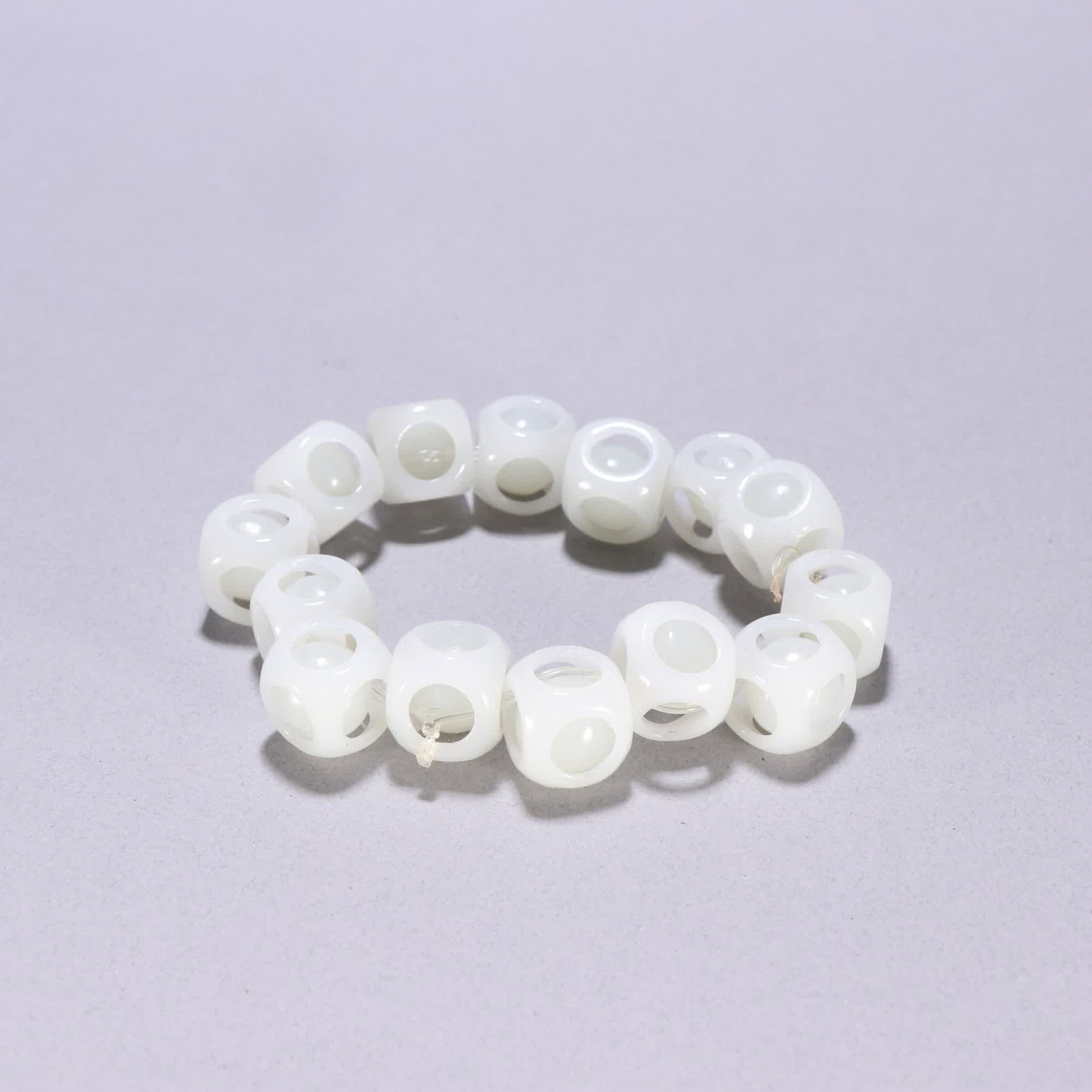 A Qing Dynasty Hetian Yululu Tong bracelet: Qing Dynasty Hetian Yululu Tong bracelet SIZE: W:1.4x1.4cm W:76.5g (The Dimensions Of All Batches Are Manually Measured.If You Need More Detailed Information, Please Contact Our Customer Service Befor