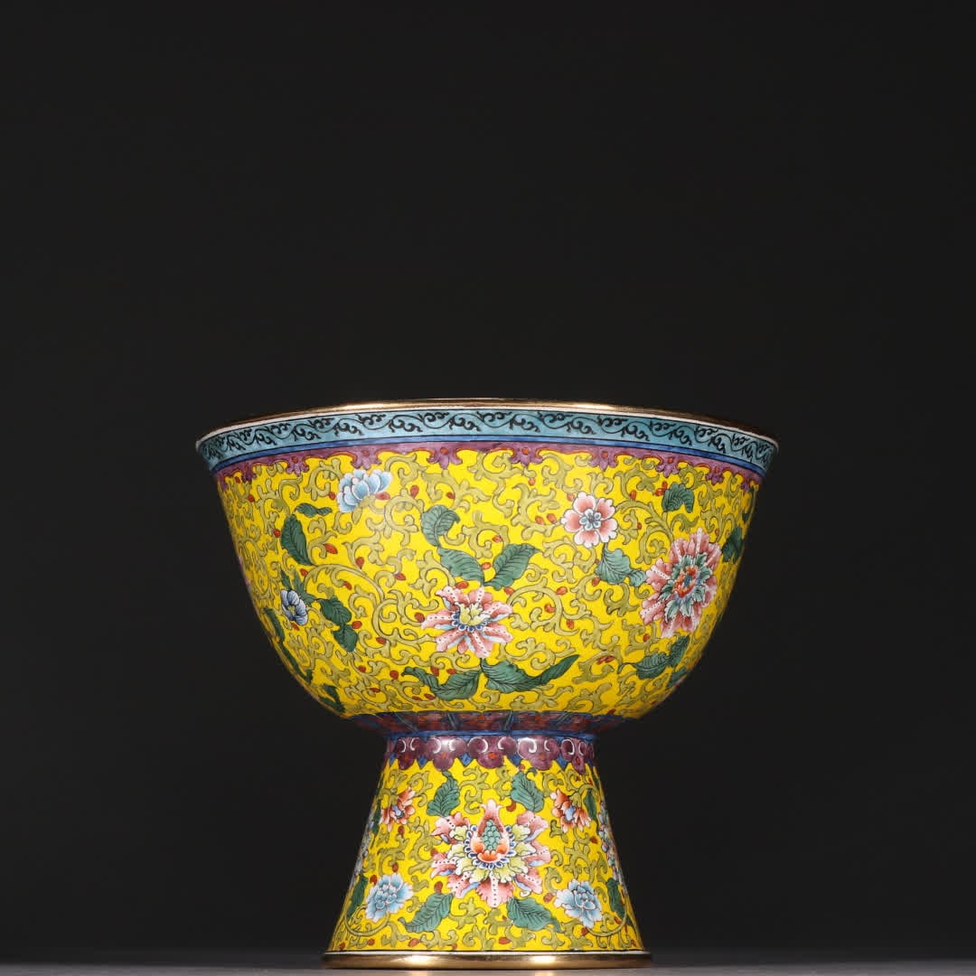 A Qing dynasty bronze gilt enamel entwined floral stemmed cup: Qing Dynasty: Bronze gilt painted enamel with entwined floral patterns on a stemmed foot SIZE: H:9.8cm W:11cm W:264.4g (The Dimensions Of All Batches Are Manually Measured.If You Need More Detailed In