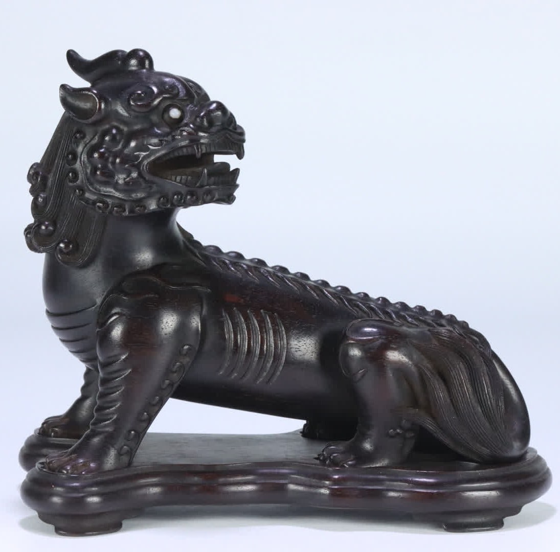 A Qing Dynasty small-leaf rosewood auspicious beast ornament: Qing Dynasty small-leaf rosewood auspicious beast ornament SIZE: 15.5x7.7x13.15cm W:349g (The Dimensions Of All Batches Are Manually Measured.If You Need More Detailed Information, Please Contact Our 