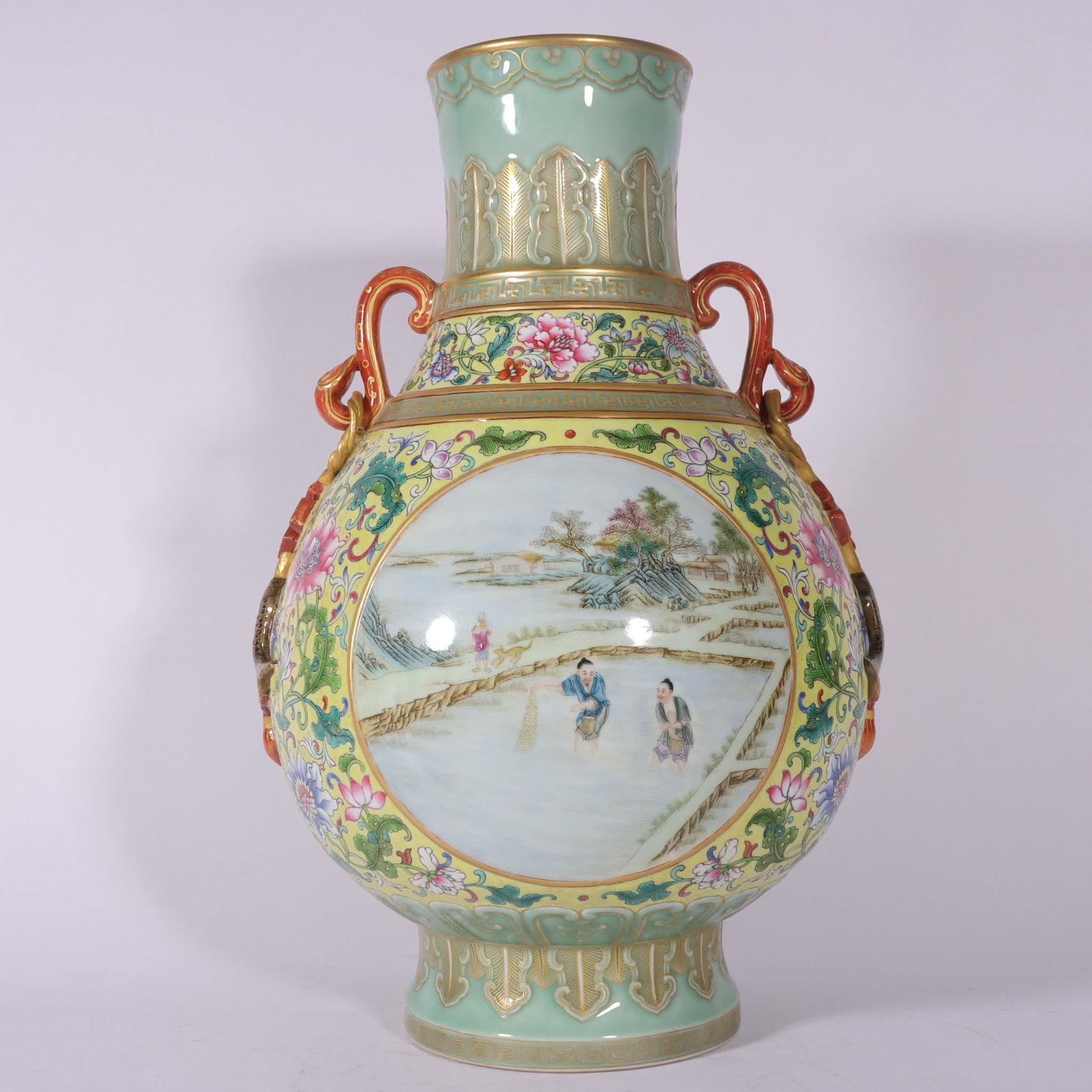 A Qing dynasty Qianlong period famille rose with yellow ground entwined lotus roots, window opening: Qing Dynasty Qianlong period, famille rose yellow ground with entwined lotus leaves, windows open for farming and weaving, ruyi wine vessel SIZE: H: 40cm, Mouth 11cm, Belly diameter 25cm, Bottom 14cm