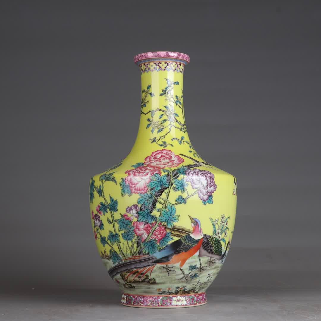 A Qing Qianlong period yellow ground enamel colorful brocade chicken flower-and-bird poetry vase: Qing Qianlong period yellow ground enamel brocade chicken floral and bird poetry vase SIZE: H:31.2cm Belly diameter 19cm (The Dimensions Of All Batches Are Manually Measured.If You Need More Detailed