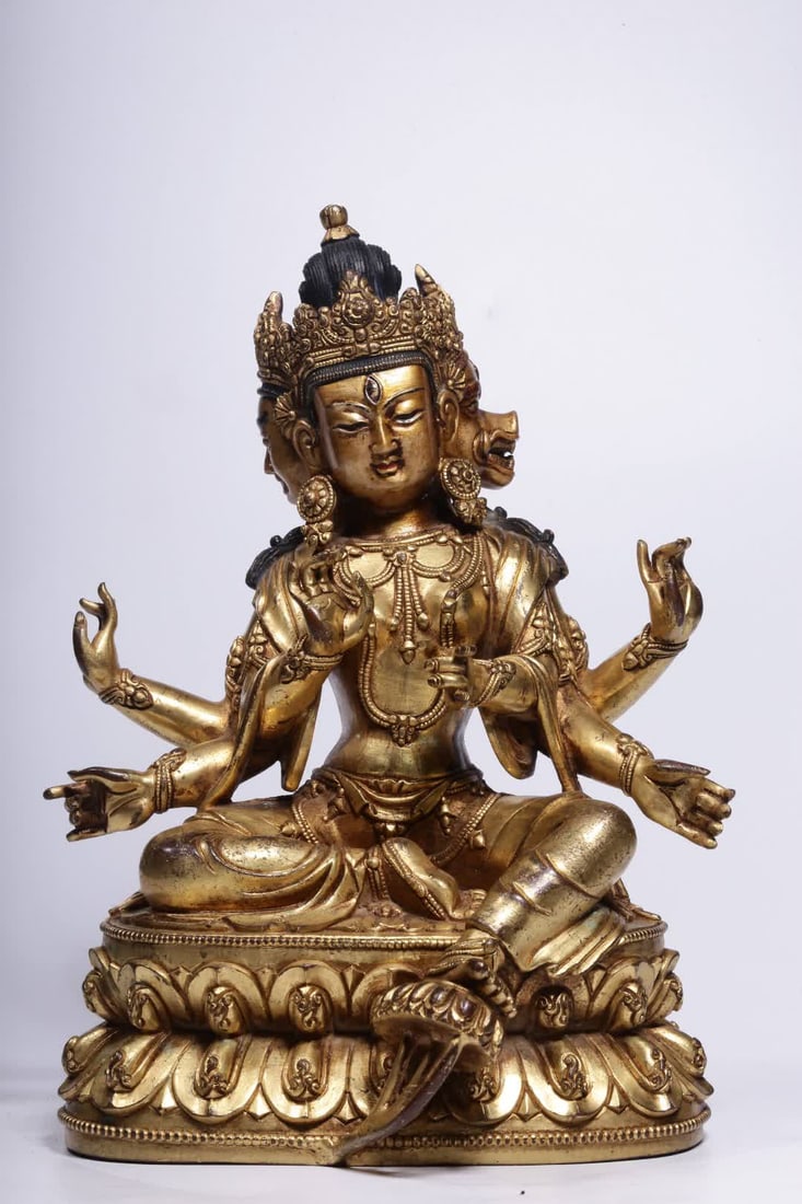 A Qing Dynasty gilded bronze statue of the Radiant Buddha Mother: Qing Dynasty gilt bronze statue of the Seated Radiant Buddha Mother SIZE: H:21cm L:14cm W:13cm W:2915g (The Dimensions Of All Batches Are Manually Measured.If You Need More Detailed Information, Pleas