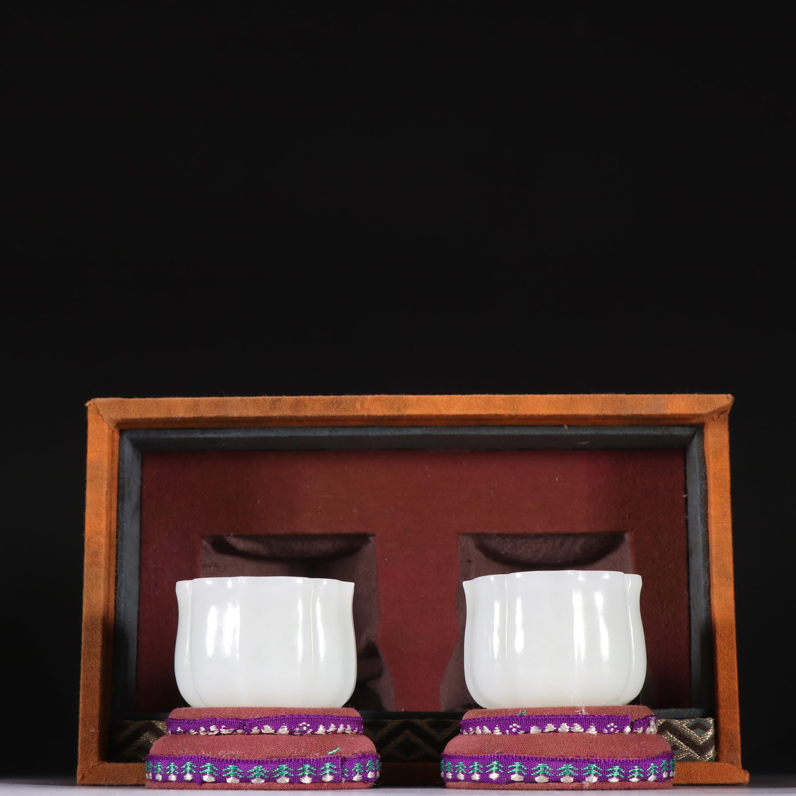 A pair of Qing dynasty Hetian jade ridge cups (1 of 9)
