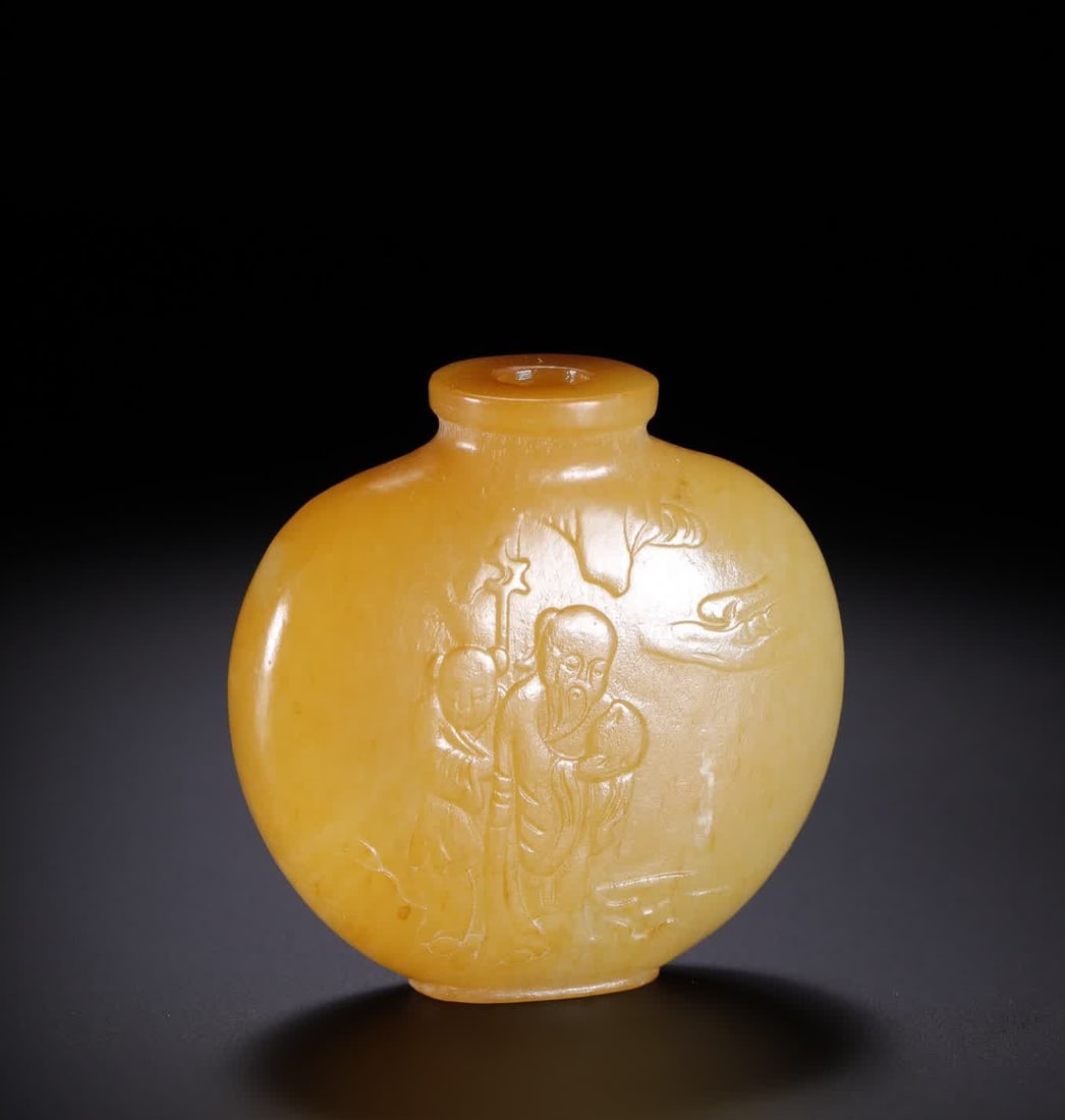 A Qing Dynasty Hetian jade Shouxing snuff bottle (1 of 9)